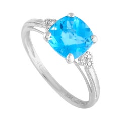 LB Exclusive 14 Karat White Gold 0.03 Carat Diamond and Blue Topaz Ring