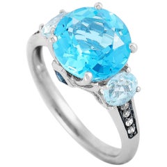 LB Exclusive 14 Karat White Gold 0.11 Carat Diamond and Blue Topaz Ring