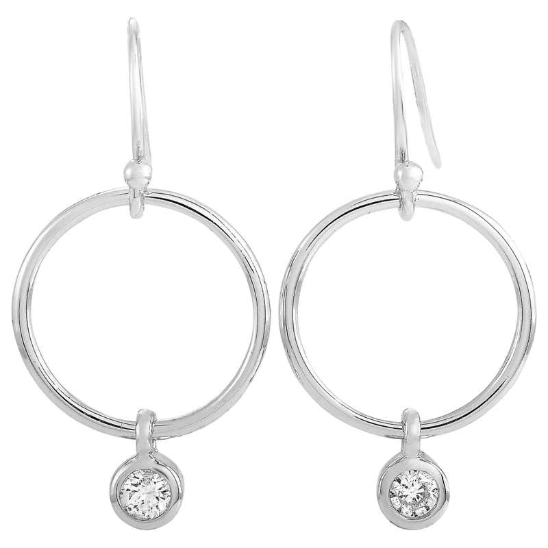 LB Exclusive 14 Karat White Gold 0.25 Carat Diamond Hoop Earrings at 1stDibs 0.25 carat diamond earrings