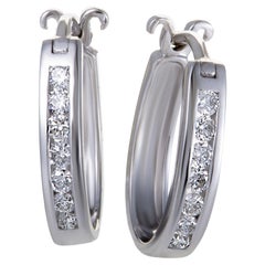 LB Exclusive 14 Karat White Gold .25 Carat VS1 G Color Diamond Small Oval Hoop