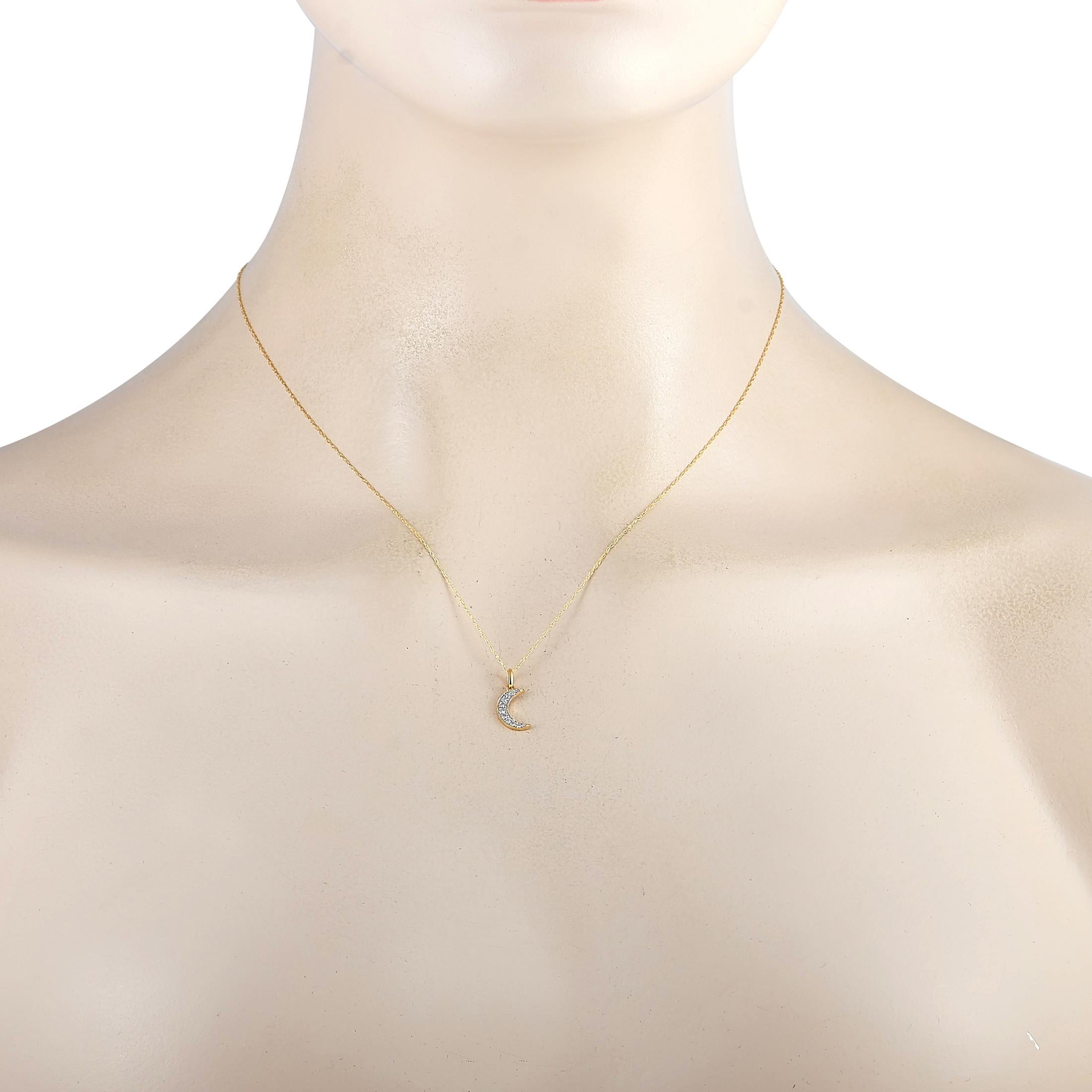 This LB Exclusive necklace is made of 14K yellow gold and embellished with diamonds that amount to 0.10 carats. The necklace weighs 0.8 grams and is presented with a 17.50” chain and a moon pendant that measures 0.50” in length and 0.25” in