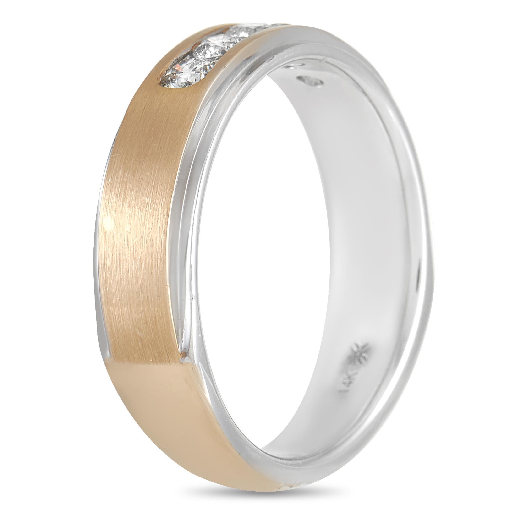 An 14K White Gold base provides the perfect foundation for the rest of this band ring’s dynamic details. It’s encircled by a second band of 14K Rose Gold and is accented in the center by 5 round-cut diamonds totaling 0.50 carats. It measures 6mm
