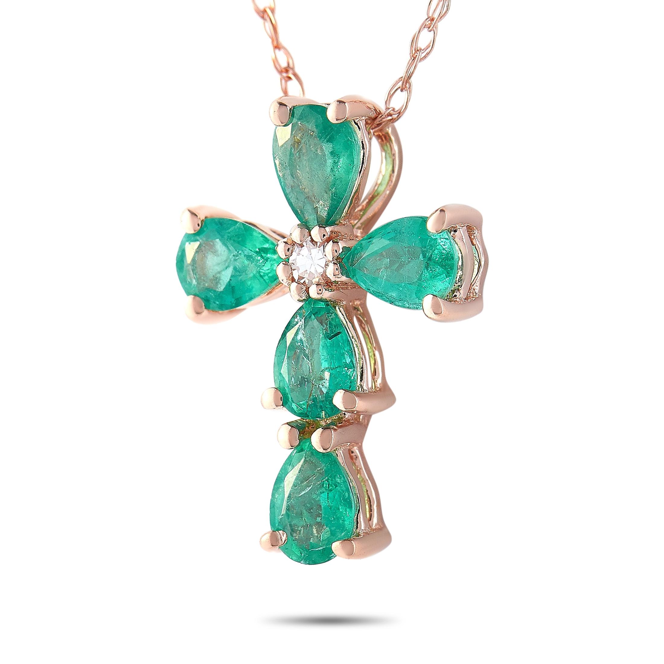 This LB Exclusive necklace is made of 14K rose gold and embellished with emeralds and a 0.01 ct diamond stone. The necklace weighs 1.3 grams and boasts a 17” chain and a cross pendant that measures 0.60” in length and 0.37” in width.
 
 Offered in