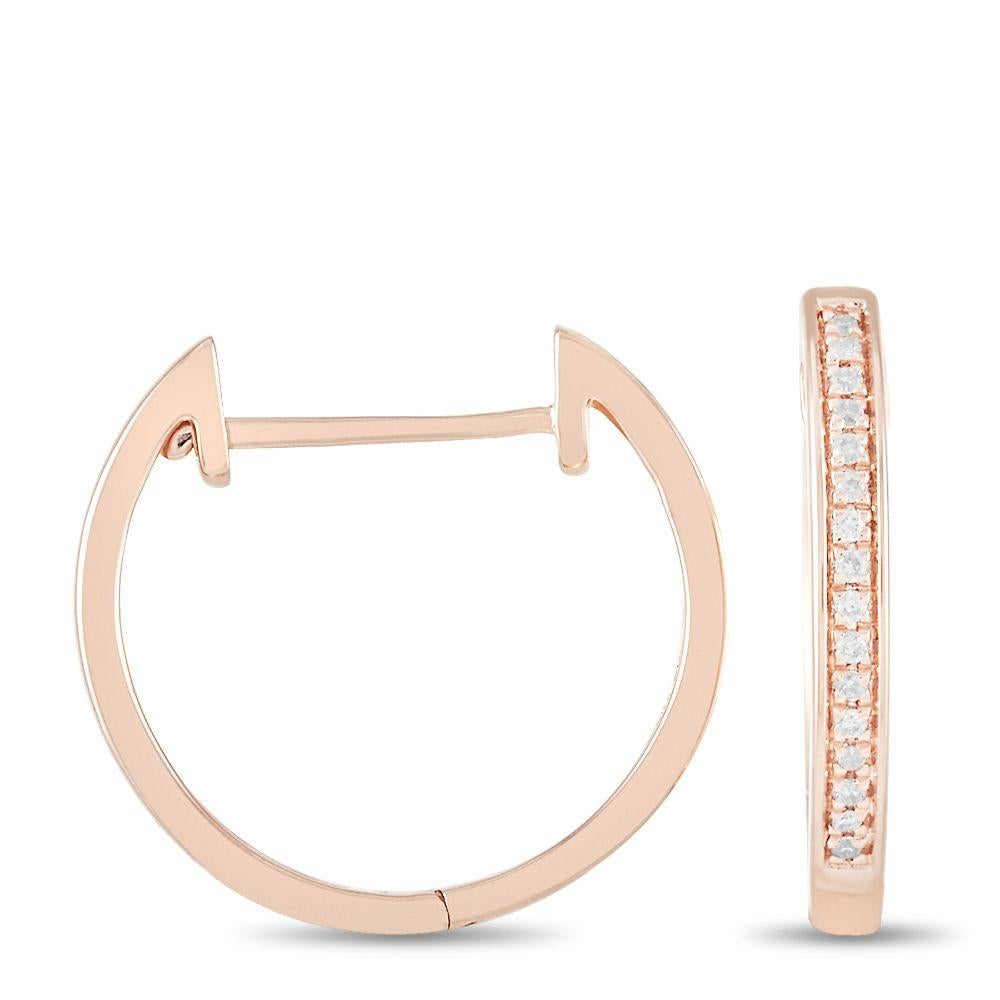 Opulent 14Krose gold makes these elegant hoop earrings a chic, sophisticated addition to your collection. Streamlined in design, their minimalist aesthetic comes to life thanks to the addition of diamonds totaling 0.08 carats. Each hoop measures 0.5
