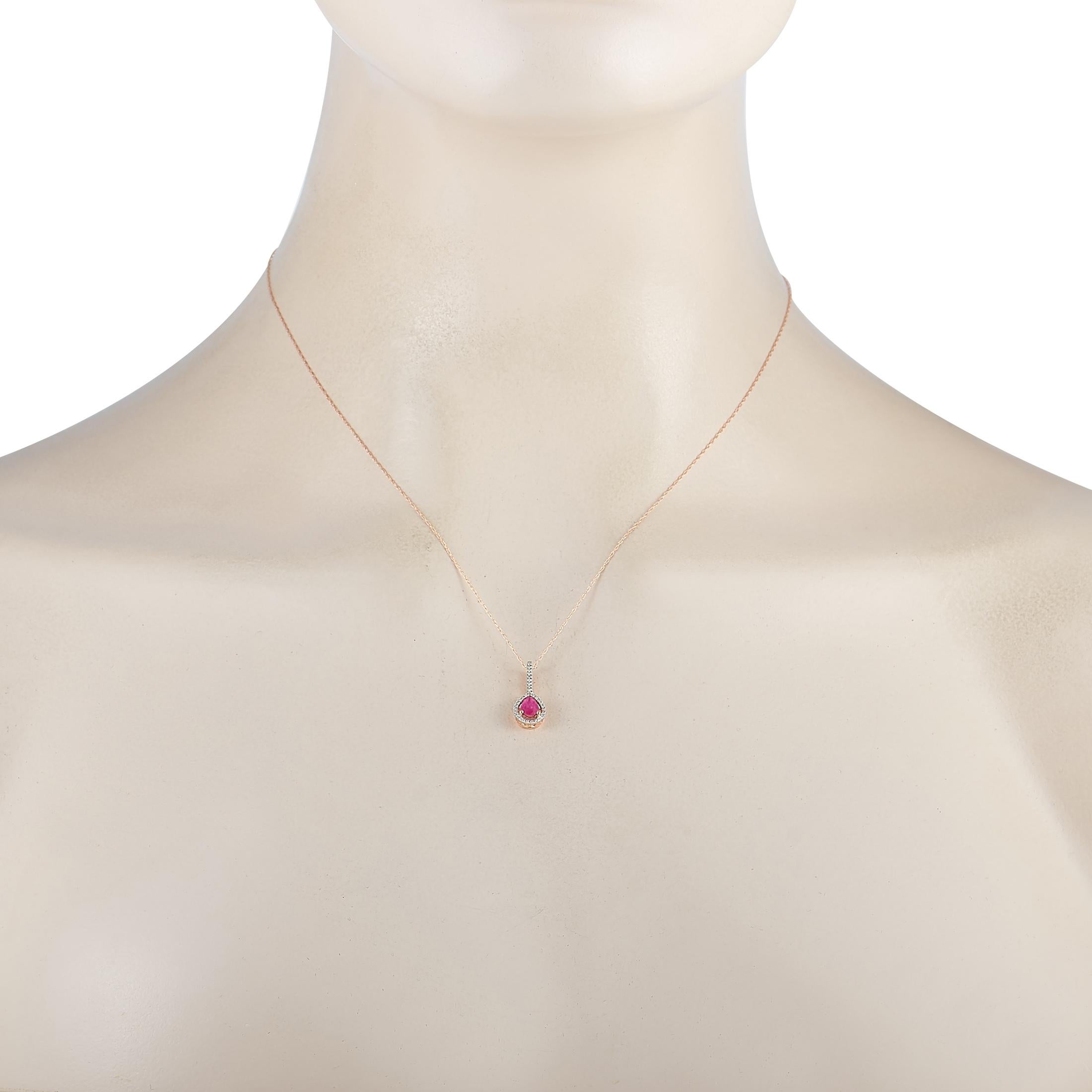 This LB Exclusive necklace is made of 14K rose gold and embellished with a 0.50 ct ruby and a total of 0.09 carats of diamonds. The necklace weighs 1.3 grams and is presented with a 17” chain and a pendant that measures 0.70” in length and 0.25” in