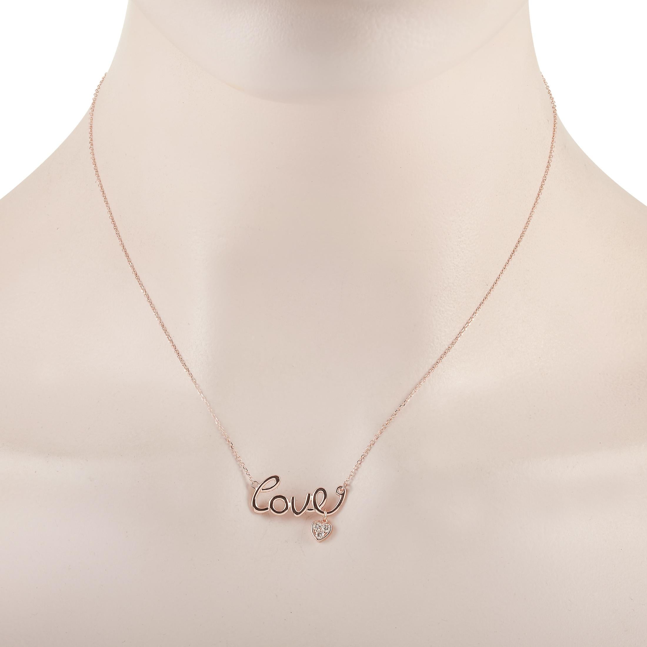 This LB Exclusive necklace is crafted from 14K rose gold and weighs 2.4 grams. It is presented with a 15” chain and boasts a love pendant that measures 0.50” in length and 1” in width. The necklace is set with diamonds that total 0.10 carats.
 
