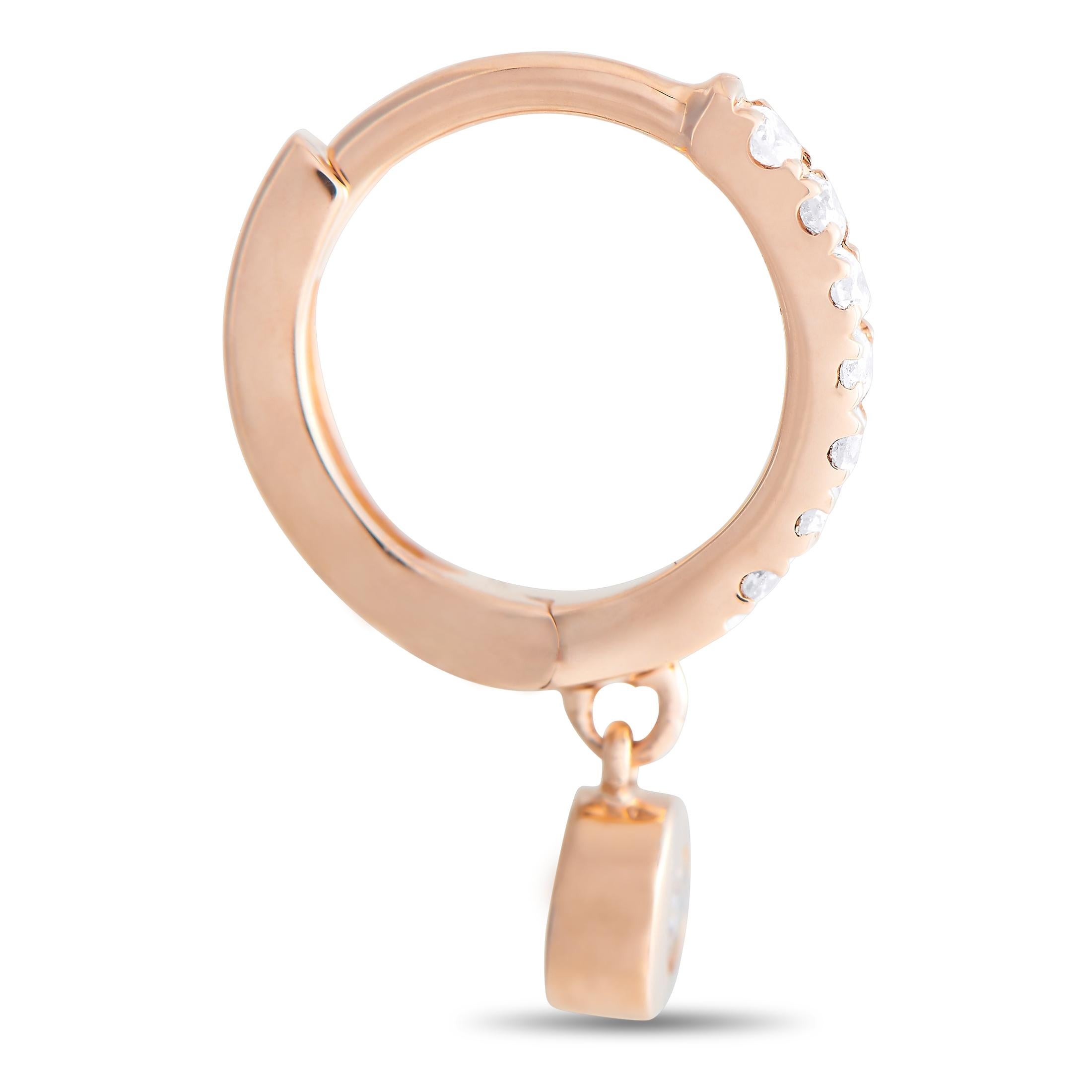 These LB Exclusive earrings are crafted from 14K rose gold and each of the two weighs 0.55 grams. They measure 0.50” in length and 0.15” in width. The pair is set with diamonds that total 0.15 carats.
 
 The earrings are offered in brand new