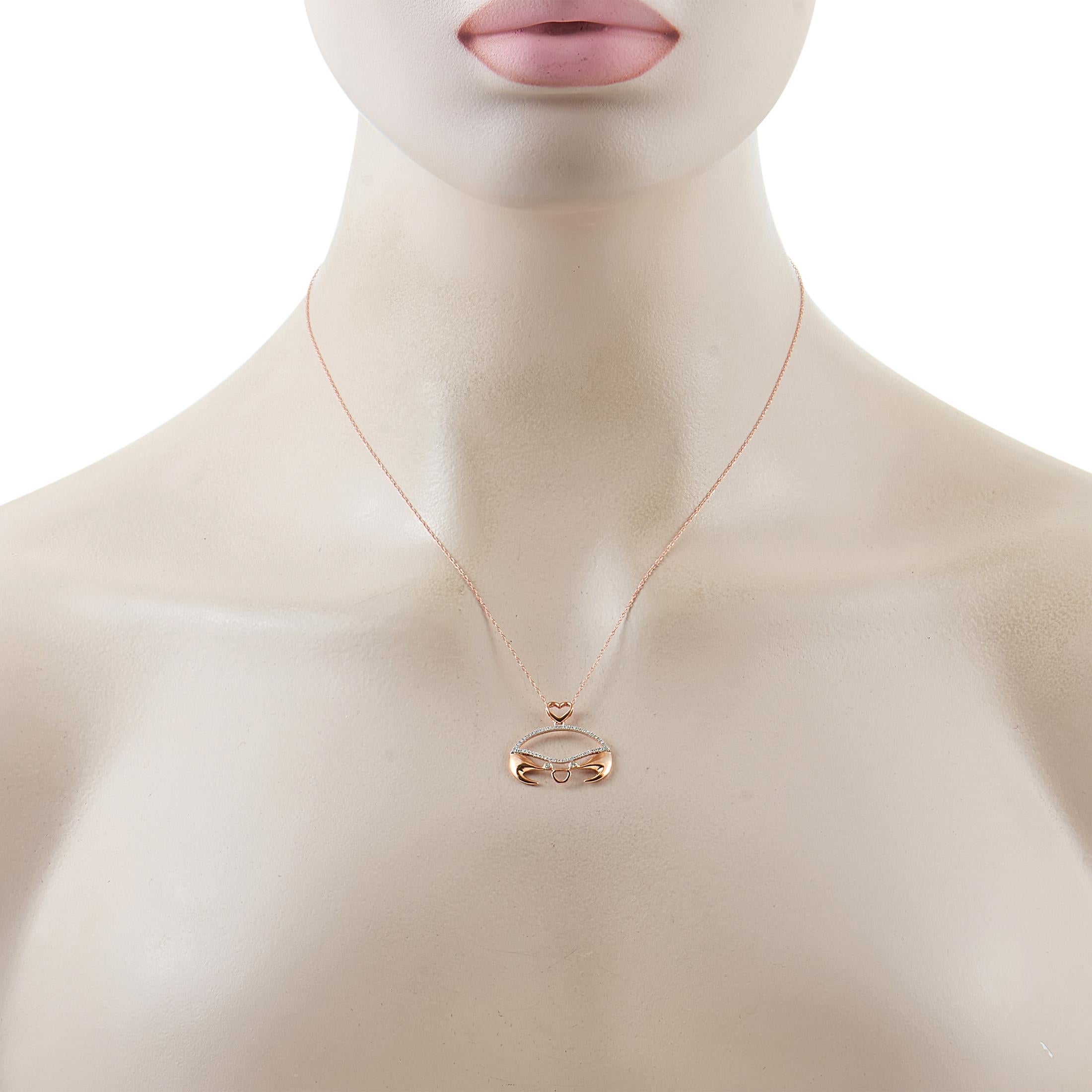 This LB Exclusive necklace is crafted from 14K rose gold and weighs 2.3 grams. It is presented with an 18” chain and boasts a crab pendant that measures 1” in length and 0.75” in width. The necklace is set with diamonds that total 0.16 carats.
 

