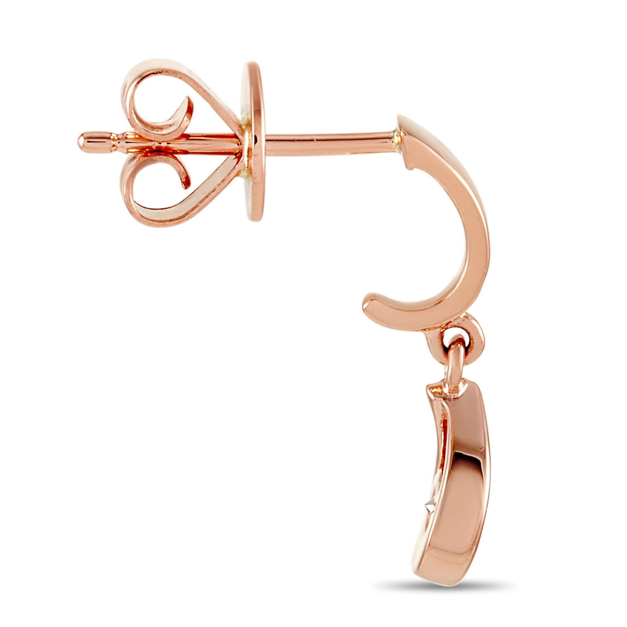 These LB Exclusive earrings are crafted from 14K rose gold and each of the two weighs 0.95 grams. They measure 0.59” in length and 0.20” in width. The pair is set with diamonds that total 0.20 carats.
 
 The earrings are offered in brand new