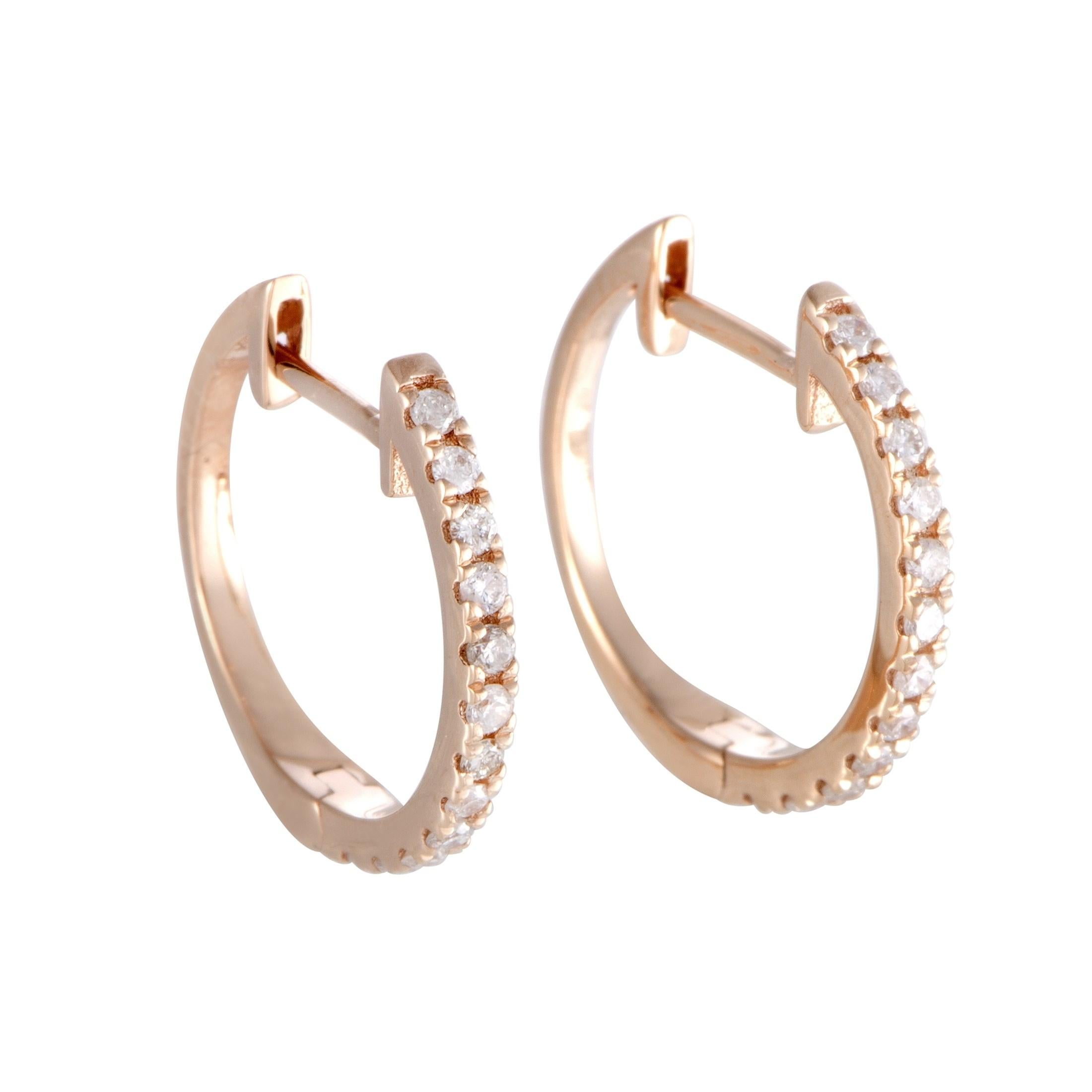 This stylish set of earrings is made of exemplary 14K rose gold and embellished with 0.22 ct of brilliant-cut diamonds. Each earring weighs 0.60 gram.