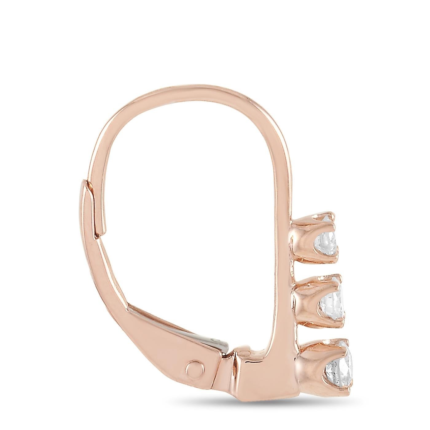 These LB Exclusive earrings are crafted from 14K rose gold and each of the two weighs 0.7 grams. They measure 0.50” in length and 0.13” in width. The pair is set with diamonds that total 0.25 carats.
 
 The earrings are offered in brand new