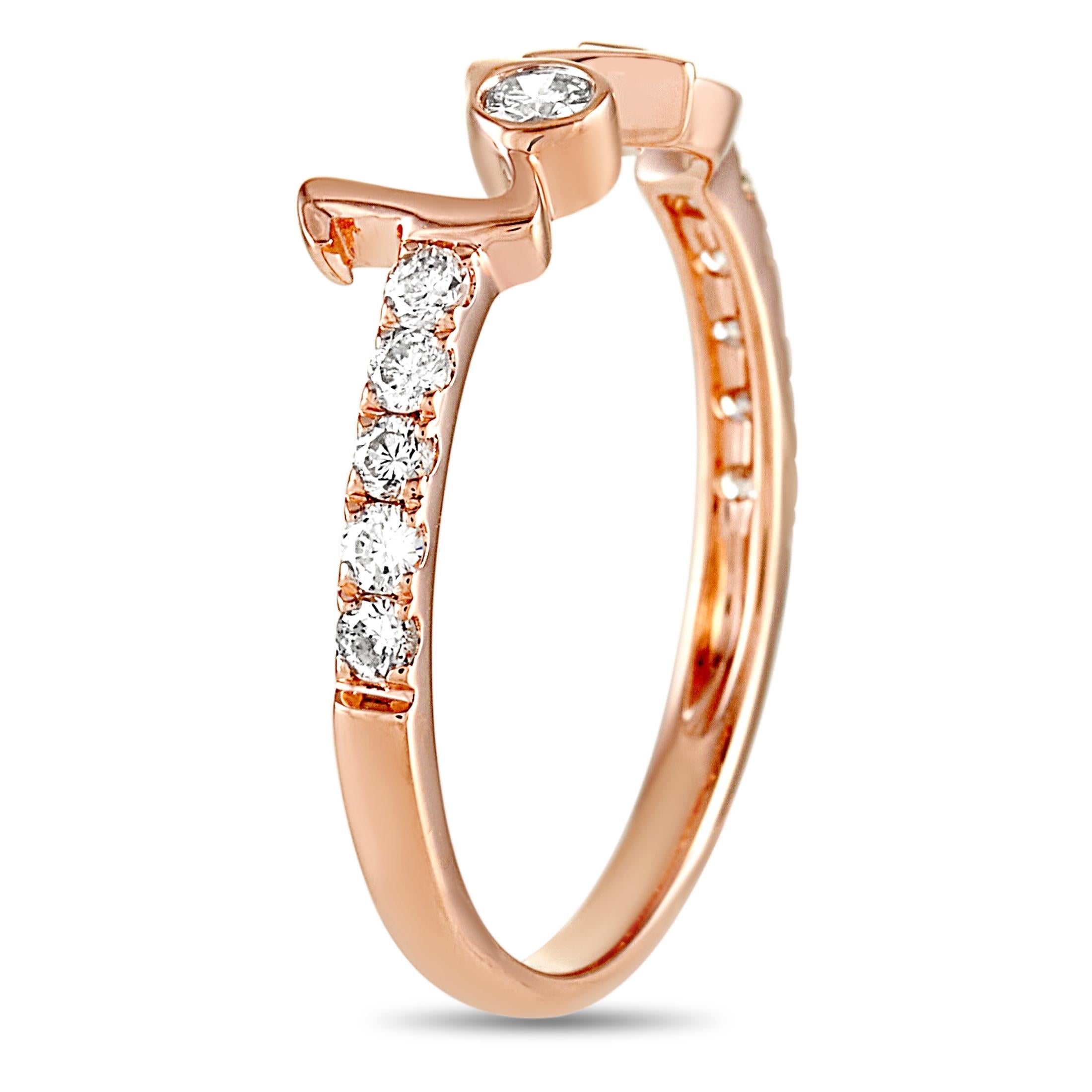 This LB Exclusive love ring is crafted from 14K rose gold and weighs 1.6 grams. It boasts band thickness of 2 mm, while top dimensions measure 5 by 20 mm. The ring is set with diamonds that total 0.25 carats.
 
 Offered in brand new condition,