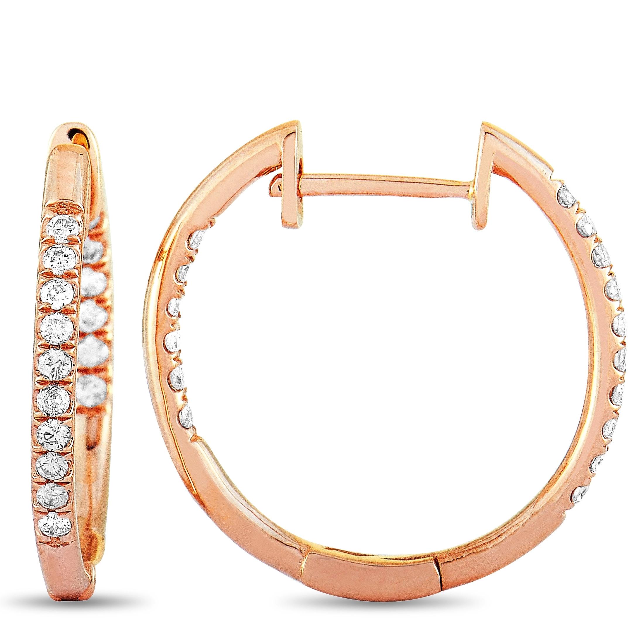 These LB Exclusive hoop earrings are made out of 14K rose gold and diamonds that total 0.25 carats. The earrings measure 0.73” in length and 0.72” in width, and each of the two weighs 1.05 grams.