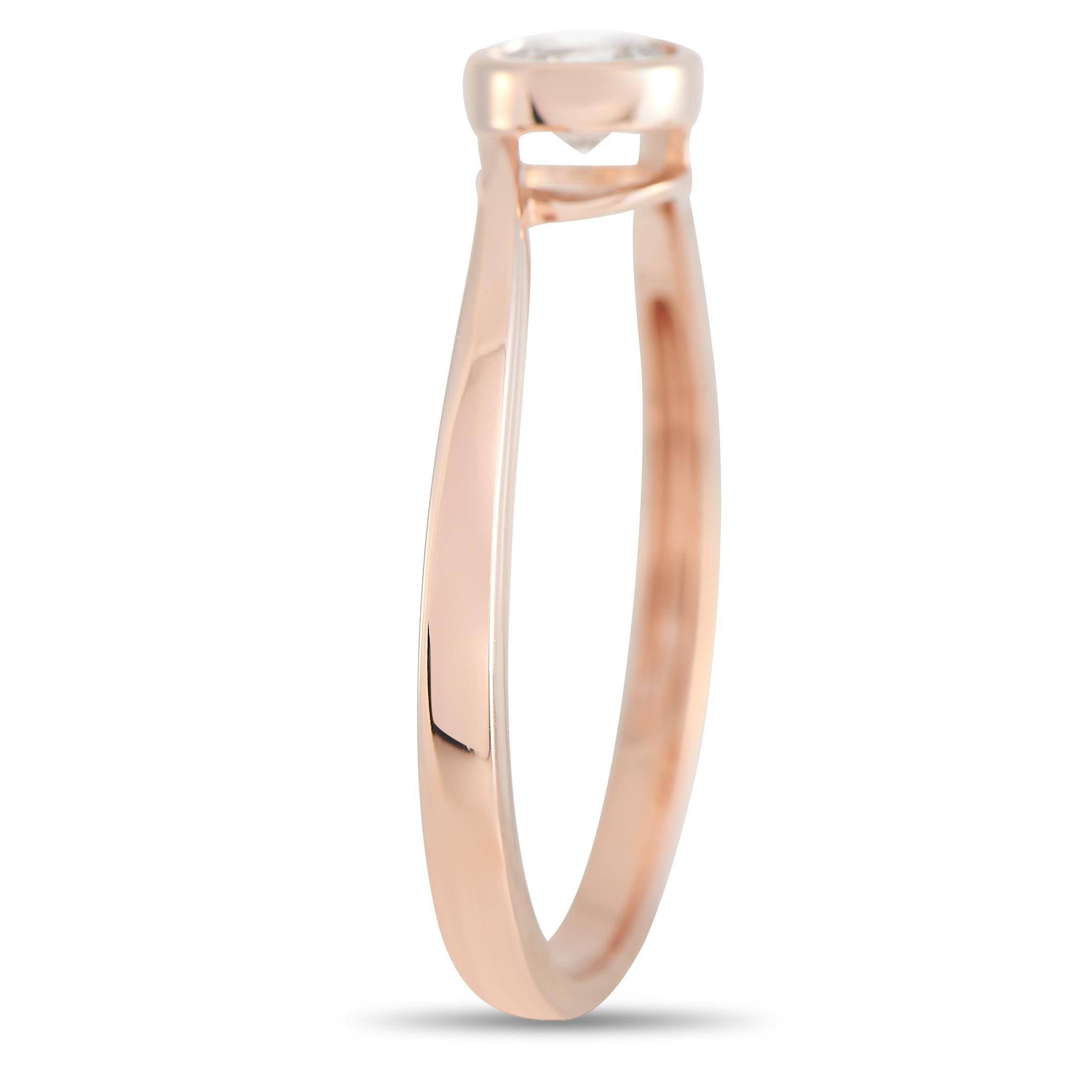 This pretty LB Exclusive ring is a classic. The band is made with 18K Rose Gold and bezel-set with a 0.26 carat round cut diamond. The ring has a band thickness of 2 mm, a top height of 3 mm, and top dimensions of 5 by 5 mm, with a total weight of