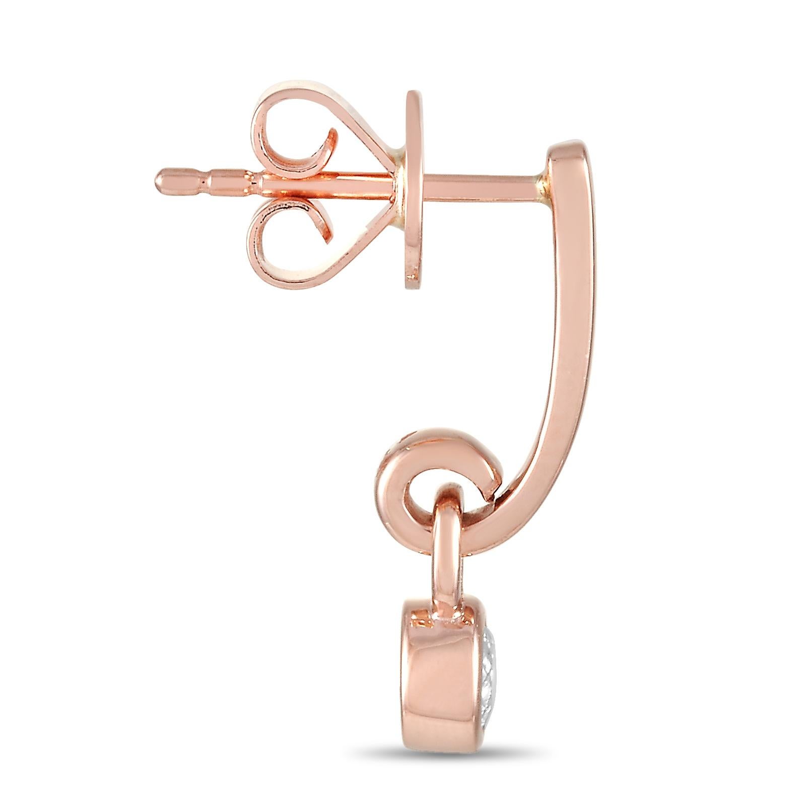These LB Exclusive earrings are made of 14K rose gold and embellished with diamonds that amount to 0.29 carats. The earrings measure 0.63” in length and 0.13” in width and each of the two weighs 1.15 grams.
 
 The pair is offered in brand new