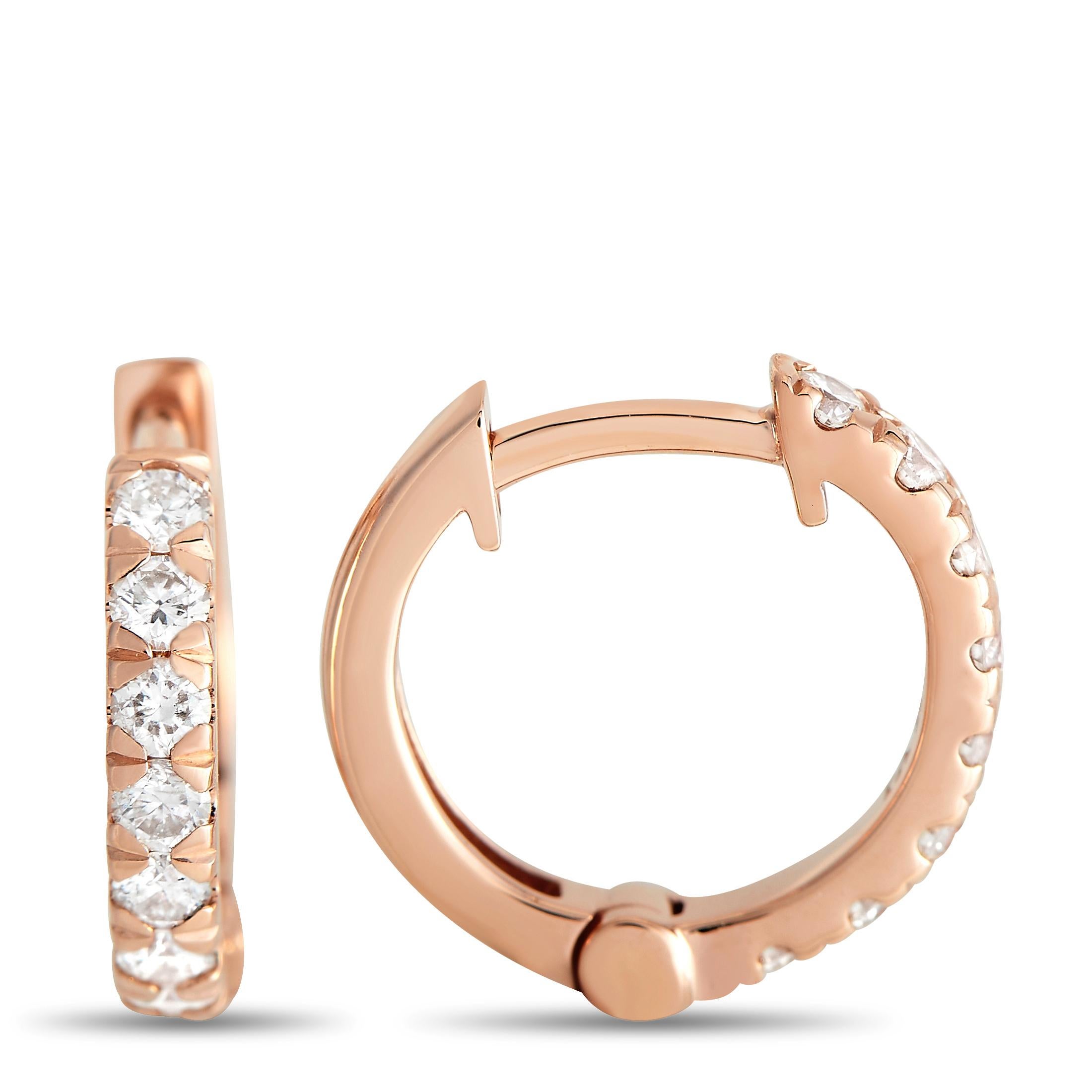 Give your everyday look a sparkling touch of style through these diamond hoop earrings in rose gold. Each 0.75-inch hoop features a simple and sleek row of round diamonds lining the front face. A lever back closure secures the hoop to your earlobe.