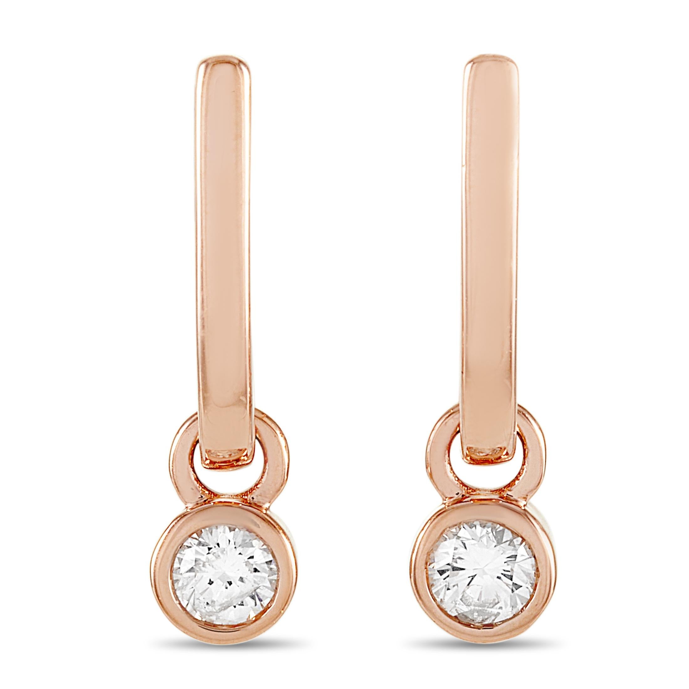 These LB Exclusive earrings are made of 14K rose gold and embellished with diamonds that total 0.40 carats. The earrings measure 0.75” in length and 0.19” in width and each of the two weighs 1.65 grams.

The pair is offered in brand new condition
