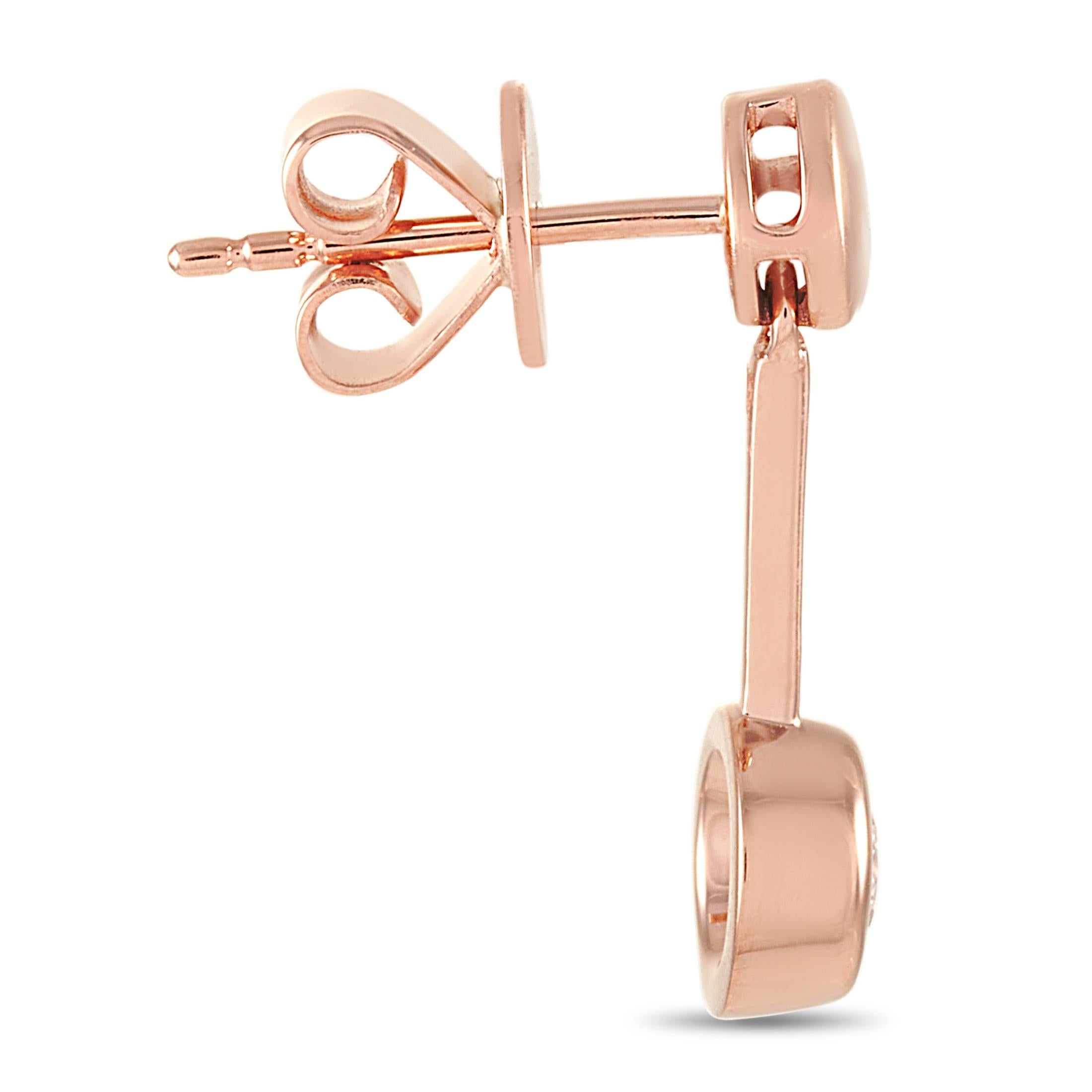 These LB Exclusive earrings are made of 14K rose gold and embellished with diamonds that total 0.58 carats. The earrings measure 0.63” in length and 0.19” in width and each of the two weighs 1.45 grams.
 
 The pair is offered in brand new condition