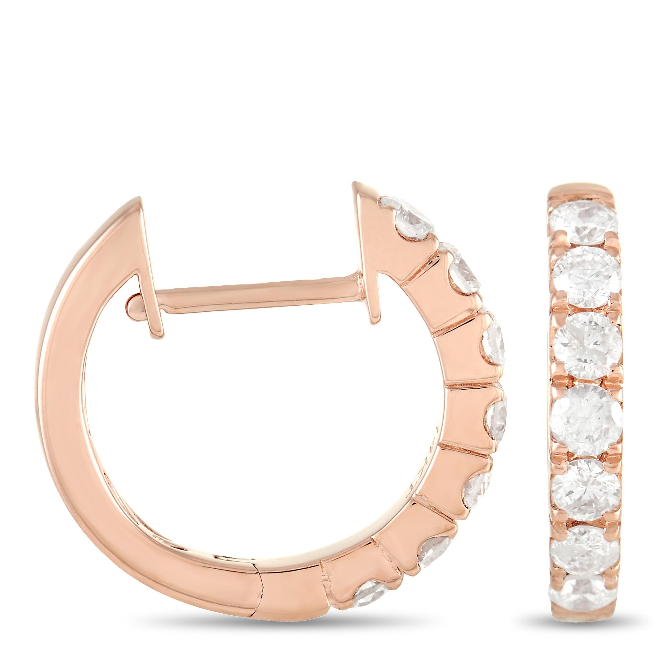 Bold, breathtaking round-cut diamonds totaling 0.59 carats add elegance to these charming hoop earrings. Each one measures .5” round and includes a stylish 14K Rose Gold setting. 
 
 This jewelry piece is offered in brand new condition and