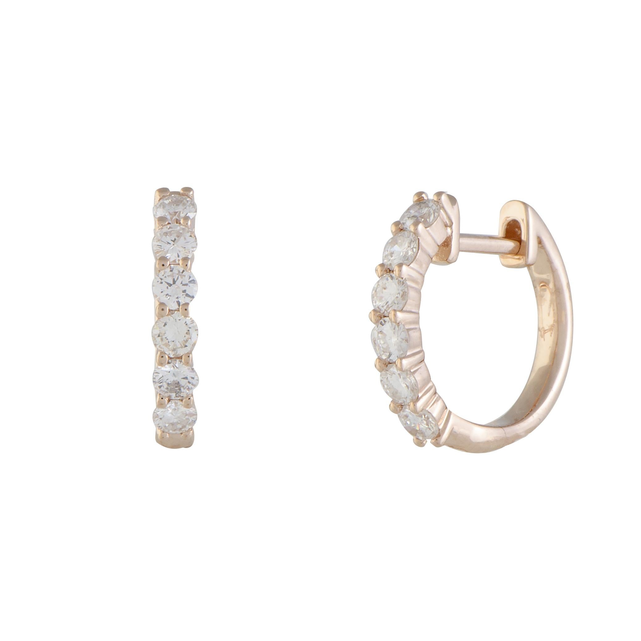 Offering a fabulously feminine allure with their gorgeously radiant 14K rose gold and lavishly sparkling diamonds amounting to 0.75 ct, these marvelous earrings are items of exceptional taste and perfectionist quality.