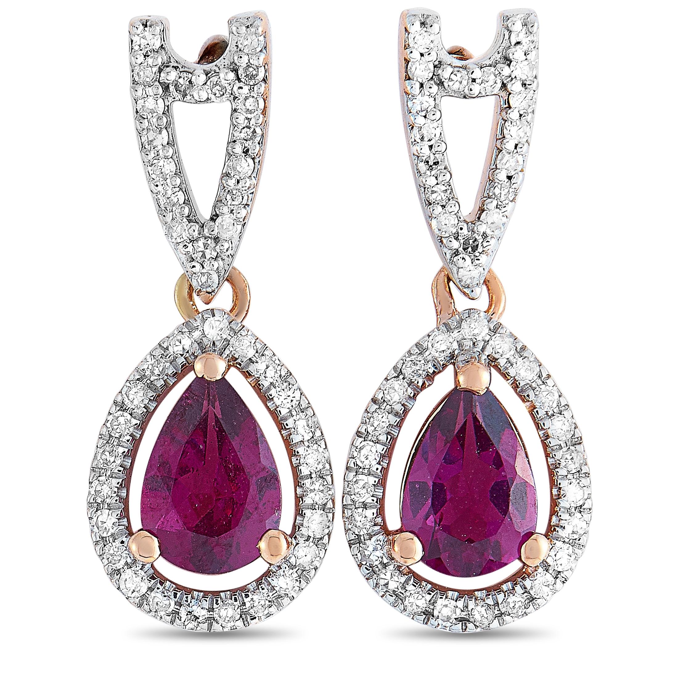 These LB Exclusive earrings are crafted from 14K rose gold and set with two garnets that amount to 0.91 carats and with a total of 0.22 carats of diamonds. The earrings measure 0.75” in length and 0.27” in width, and each of the two weighs 1.15