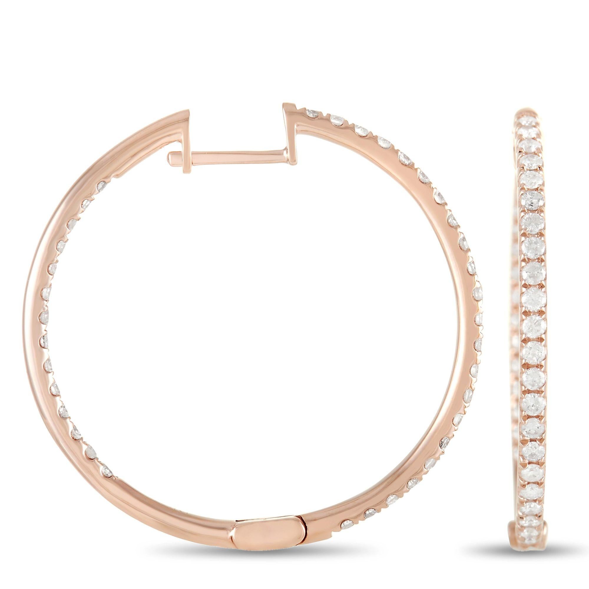 These stylish hoop earrings are poised to make a sparkling statement. Each one of these bold 1” round hoops is made from opulent 14K Rose Gold and comes complete with a series of shimmering round-cut diamonds, which together possess a total weight