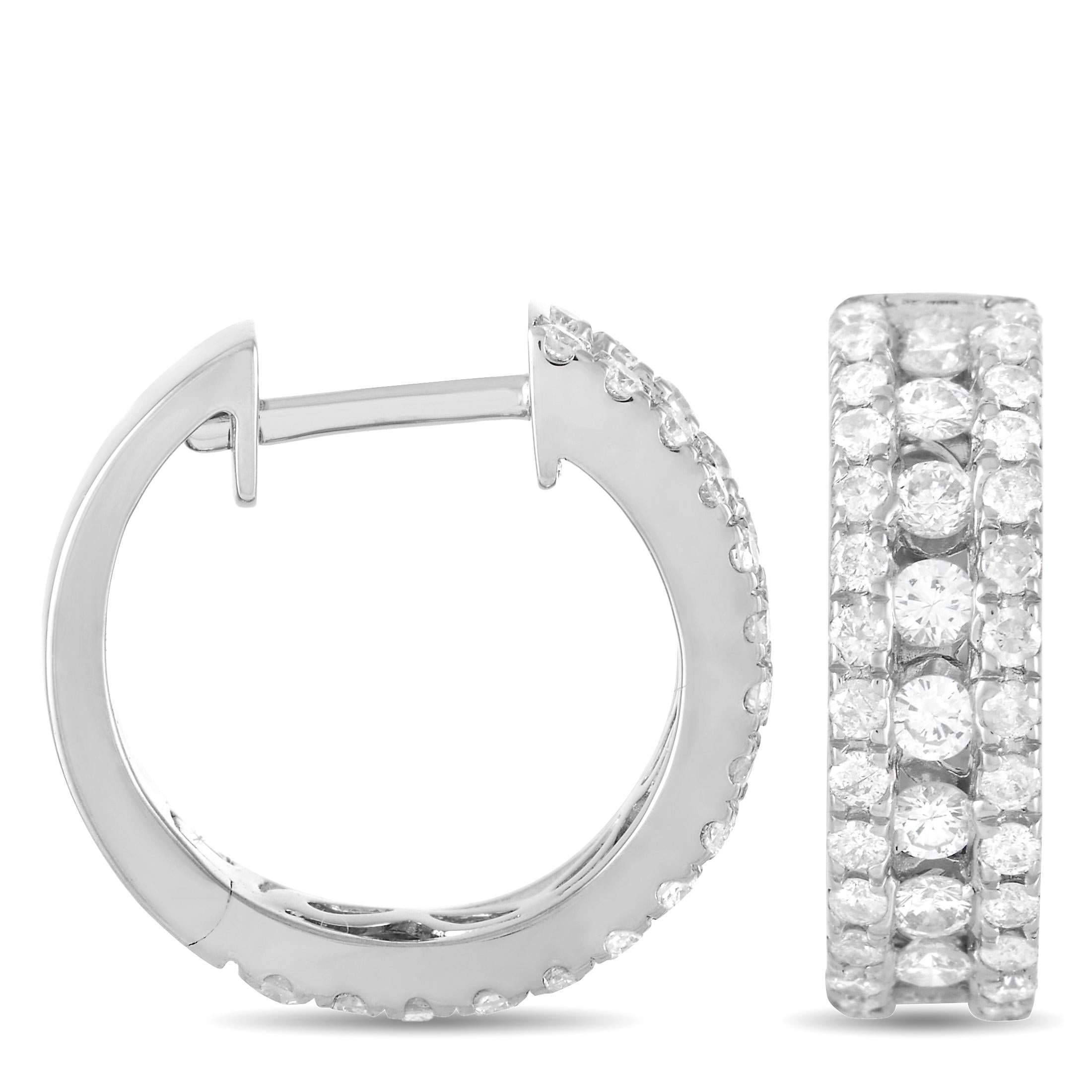 These stylish hoop earrings will sparkle and shine every time they catch the light. On these earrings - which measure .5” round - a 14K white gold setting provides the perfect foundation for diamonds totaling 1.0 carats. 
 
 This jewelry piece is
