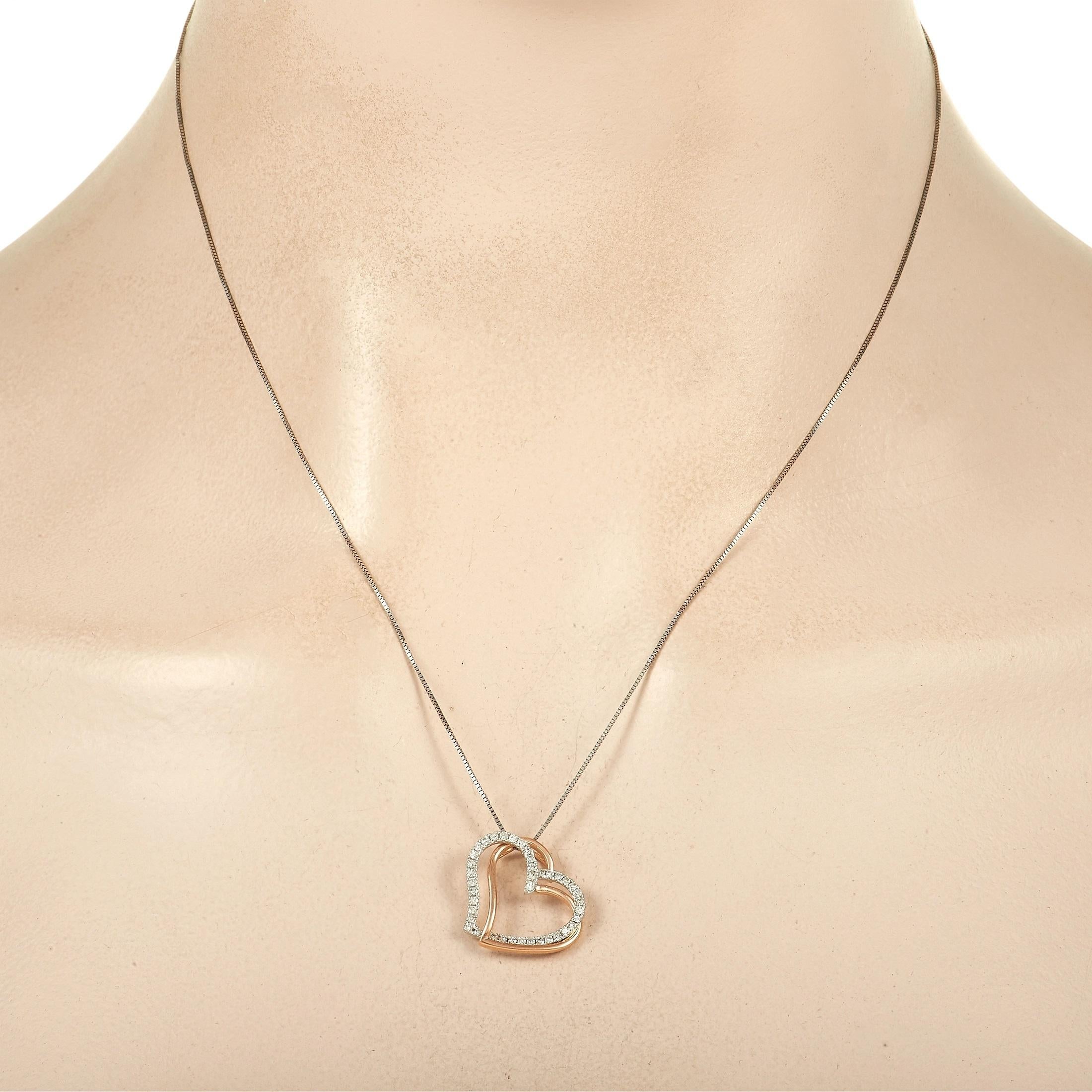 This elegant necklace is ready to serve as a stylish symbol of your love. Suspended from a sleek box chain measuring 17.5” long, you’ll find pendant measuring 0.75” long and 0.65” wide. It features a pair of heart motifs - one made from opulent 14K