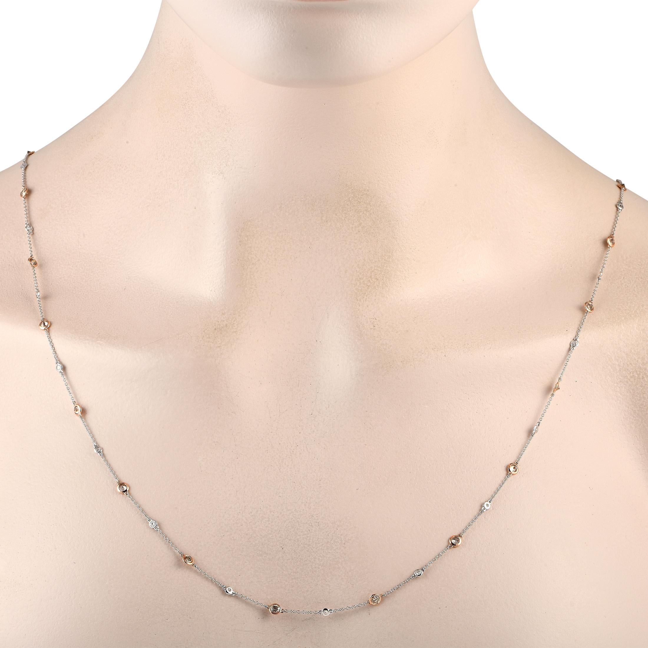 A stunning combination of 14K White Gold and 14K rose gold add texture and dimension to this elegant, understated necklace. This piece measures 31 long and comes complete with a series of sparkling diamonds totaling 3.23 carats.This jewelry piece is