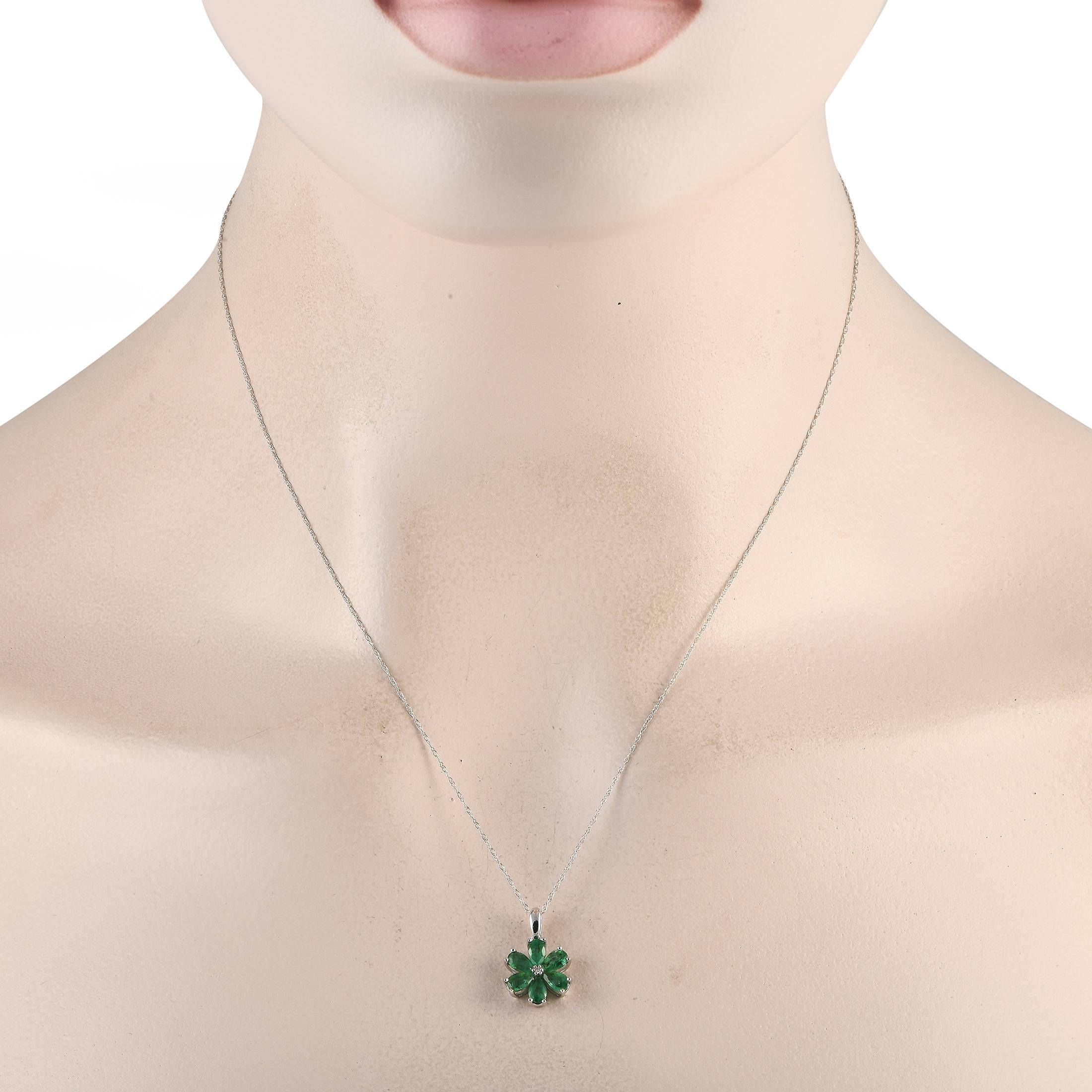Blooming year-round, this flower necklace is ready to polish your looks no matter the season. The necklace features an 18 cable chain in 14K white gold, holding a 0.75 by 0.50 flower-shaped pendant with emerald petals and a 0.01 ct diamond
