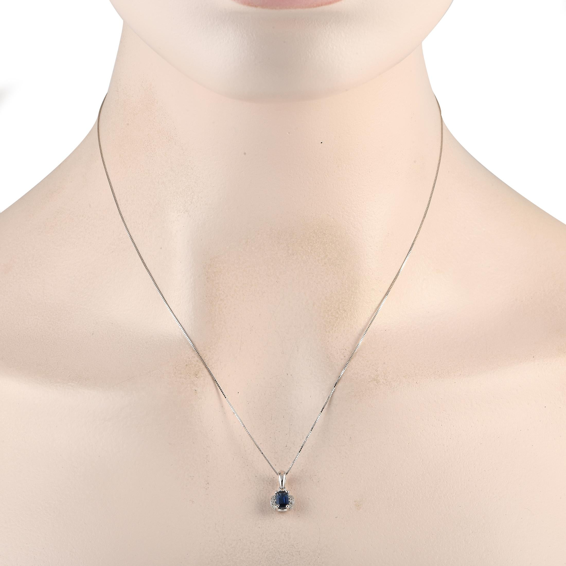 A breathtaking sapphire serves as a stunning focal point on this impeccably crafted necklace. The 14K white gold pendant measures 0.50 long by 0.25 wide and includes diamond accents totaling 0.03 carats. This elegant accessory comes complete with an