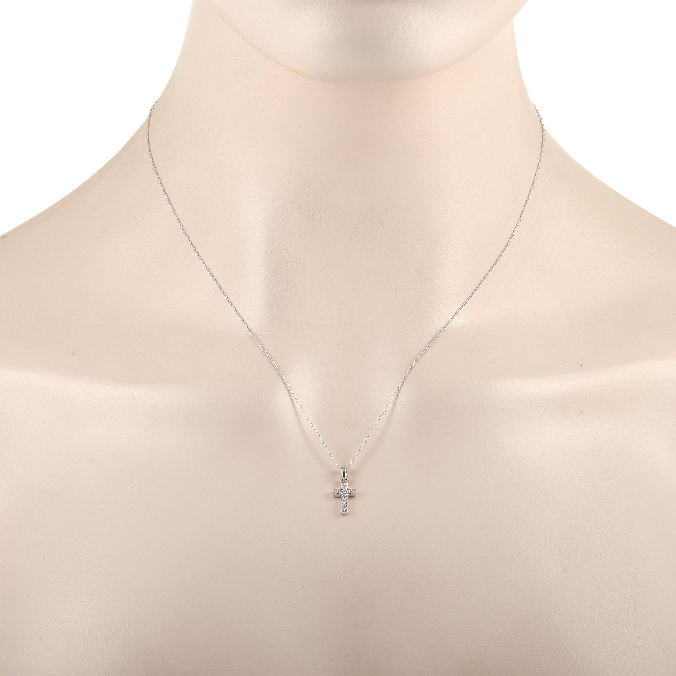 Crafted from 14K White Gold, this charming necklace is the perfect for anyone with strong faith. Attached to the 17.5” chain, you’ll find a cross-shaped pendant that is beautifully accented by glittering diamonds totaling 0.05 carats. The pendant