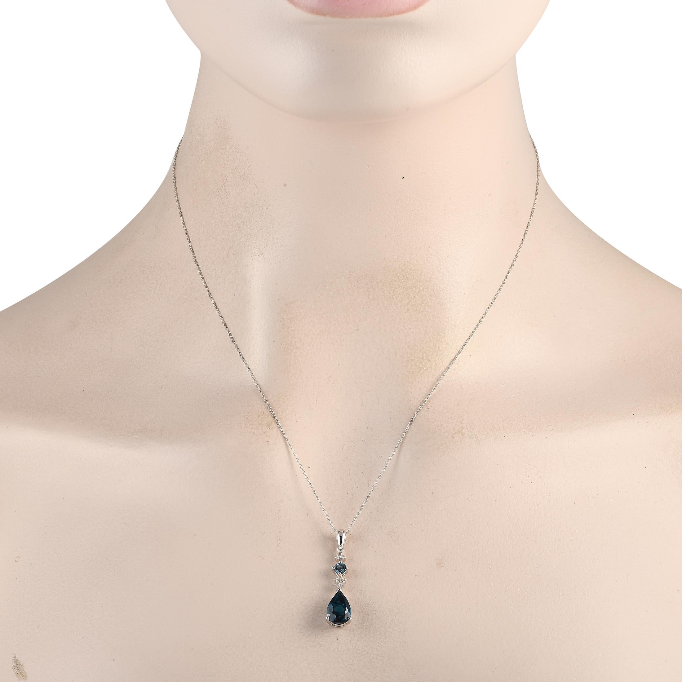 Deep blue Topaz gemstones serve as a stunning focal point on this incredibly chic necklace. Suspended from an 18 chain, youll find a dynamic pendant that comes to life thanks to sparkling diamonds totaling 0.05 carats. The pendant is crafted from