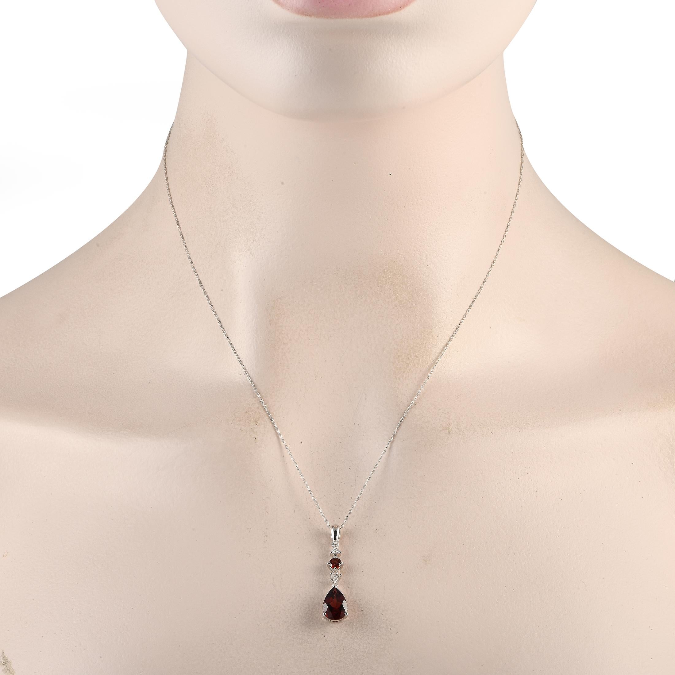Add a stylish pop of color to any ensemble with this impeccably crafted necklace. Ideal for any occasion, this sophisticated accessory features a 14K white gold pendant measuring 1.25 long by 0.25 wide suspended from an 18 chain. It also includes