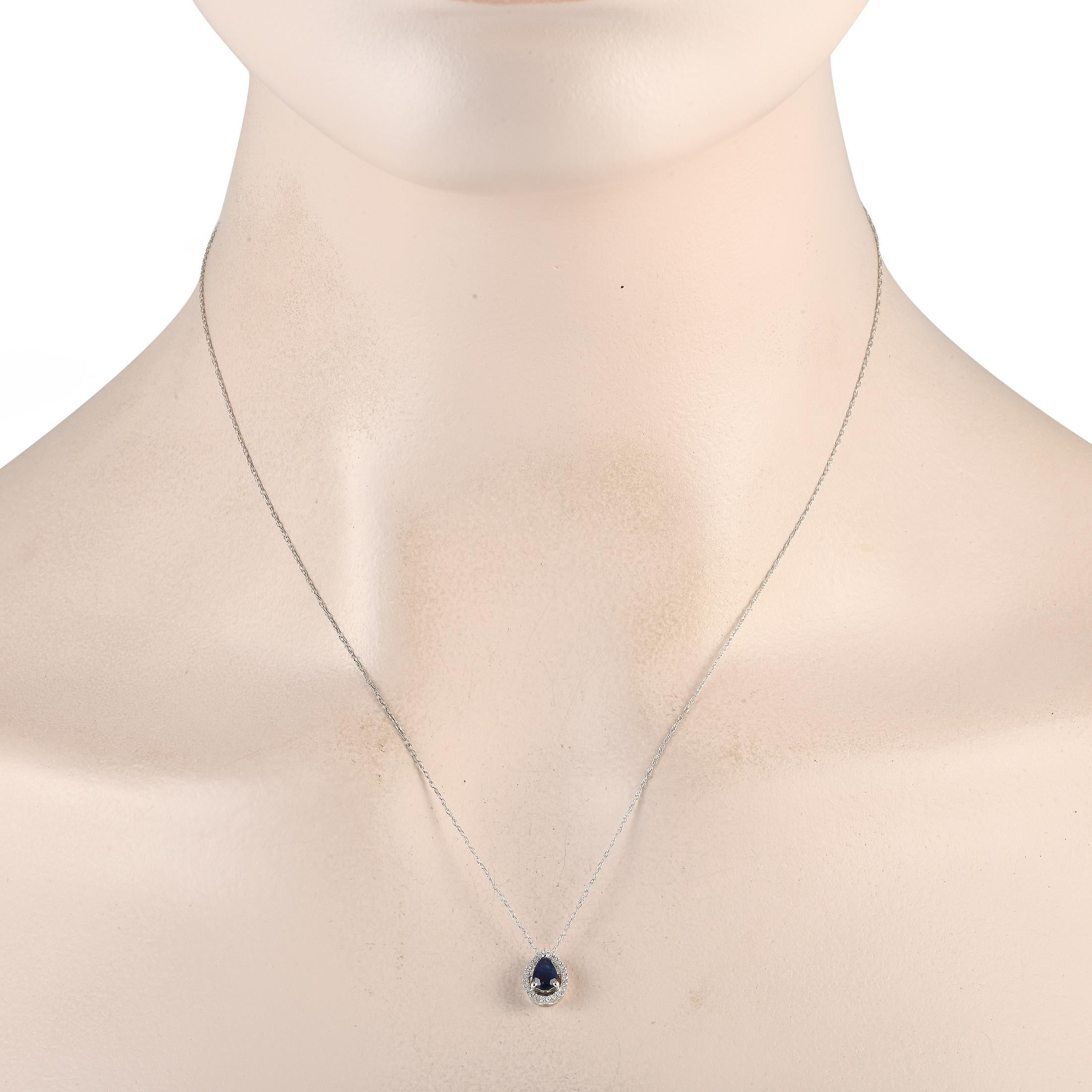 This necklace is a luxury piece with a timeless sense of style. Suspended from an 18 chain, youll find a 14K White Gold pendant that is elevated by a stunning Sapphire center stone and sparkling Diamonds totaling 0.07 carats. The pendant measures