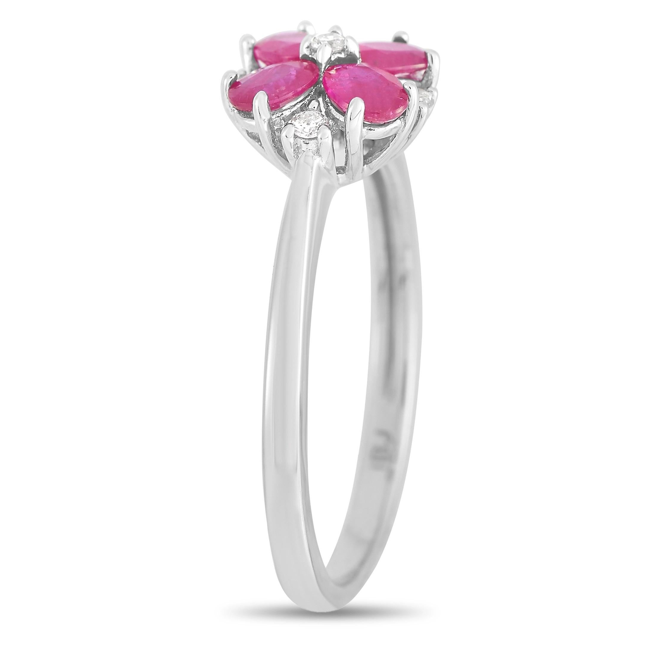 A cluster of oval-cut rubies add a pop of color to this elegant, understated ring. Accented by diamonds with a total weight of 0.08 carats, this piece’s sleek 14K White Gold setting features a 1mm wide band and a 5mm top height. 
 
 This jewelry