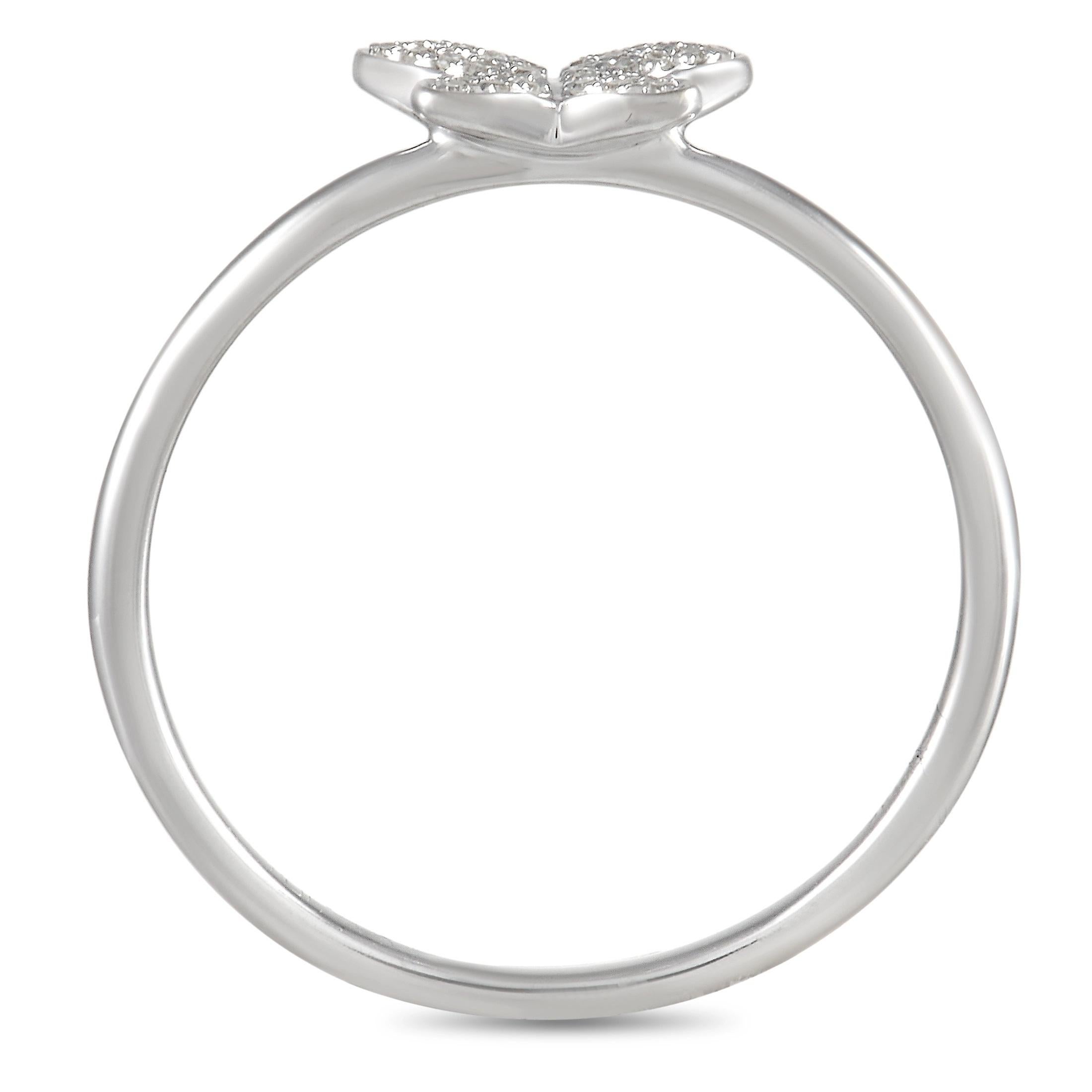 A sweet butterfly-shaped accent covered in diamonds with a total weight of 0.08 carats make this a charming addition to any jewelry collection. Sleek and simple, this understated piece features a 14K White Gold setting with a 1mm wide band and a