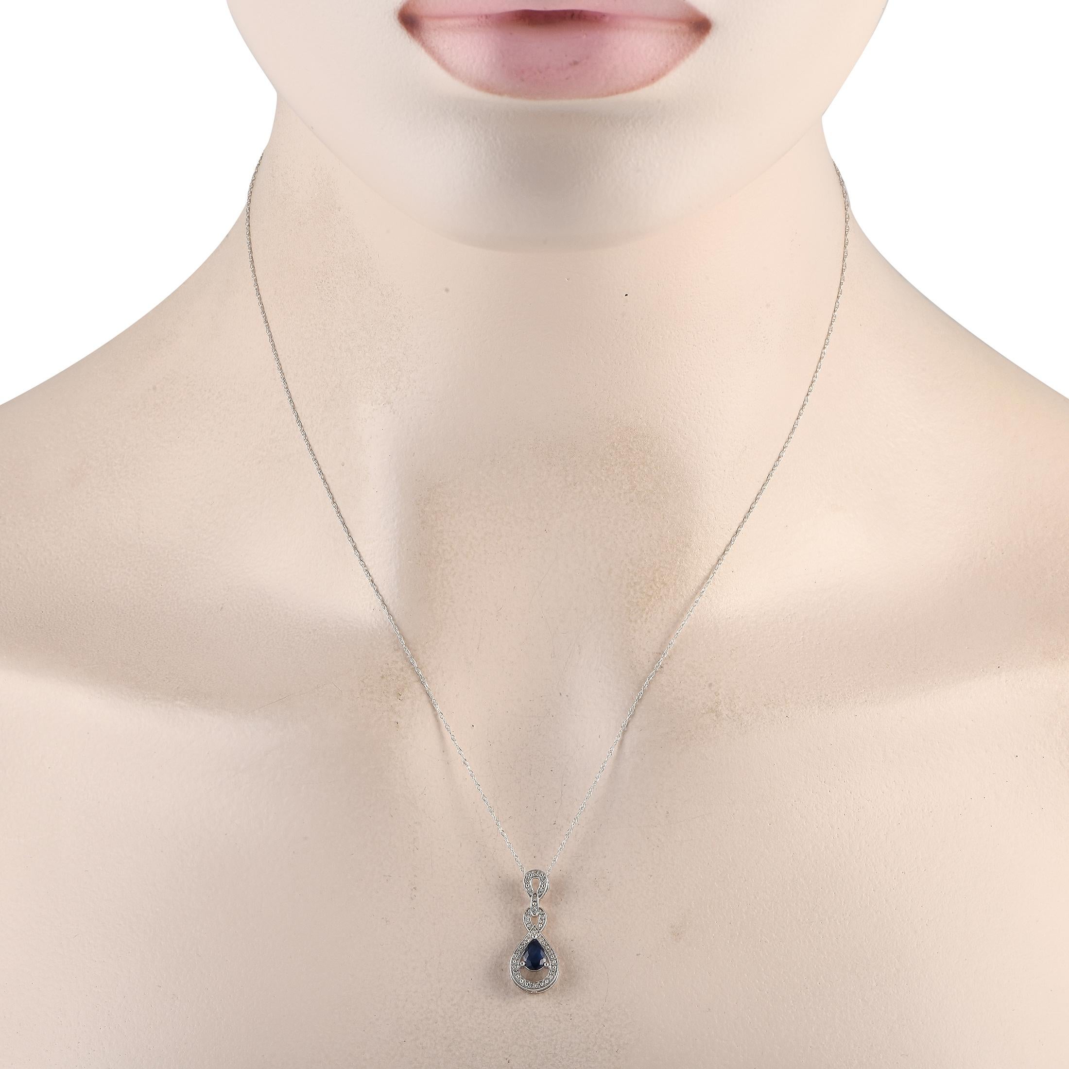 A stunning combination of gemstones makes this luxury necklace incredibly captivating. On the intricate 14K white gold pendant, youll find a stunning oval-cut sapphire gemstone paired with inset diamond accents totaling 0.08 carats. It measures 0.85