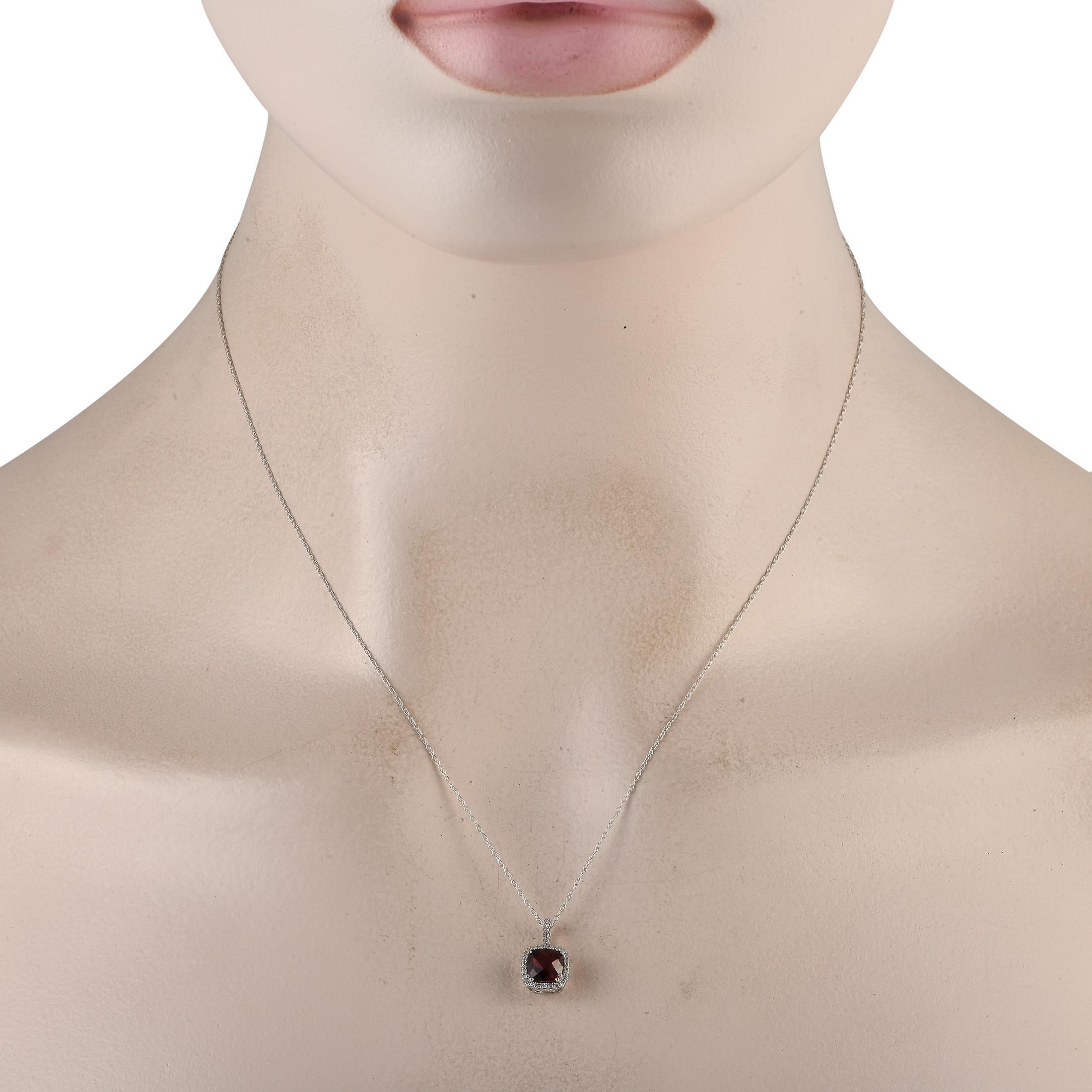 A breathtaking Garnet gemstone is surrounded by a halo of Diamonds totaling 0.09 carats on this exquisite, timeless necklace. This piece is crafted from 14K white gold and includes a pendant measuring 0.50 long by 0.25 wide suspended from an 18