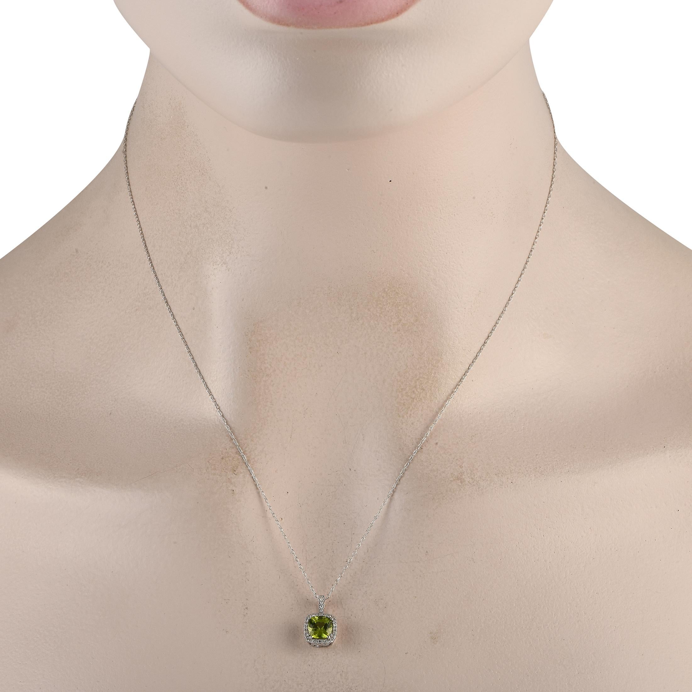This luxurious necklace will never go out of style. Suspended from a delicate 18 chain, youll find an opulent 14K white gold pendant measuring 0.50 long by 0.25 wide. At the center, a stunning Peridot gemstone comes to life thanks to sparkling