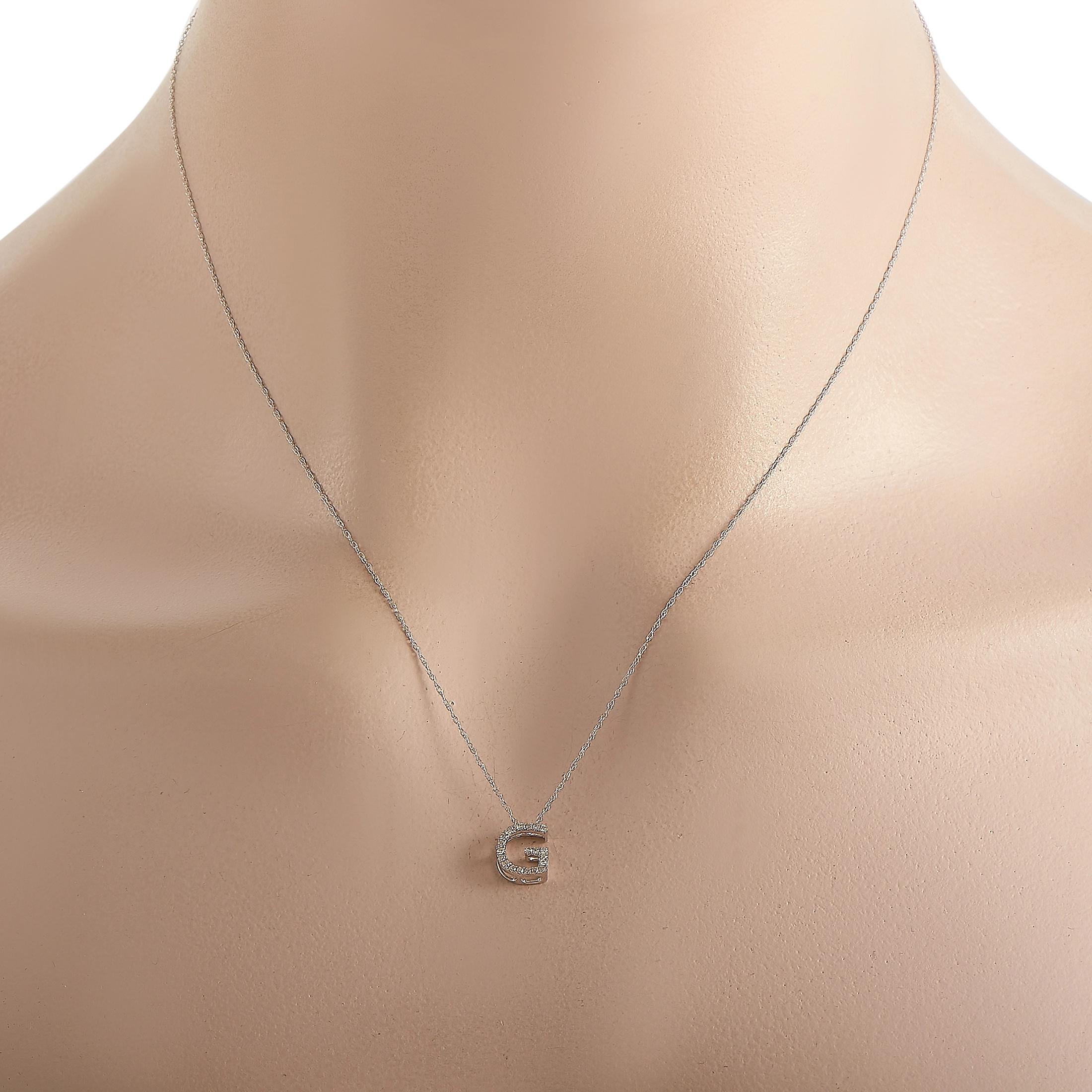 This pretty LB Exclusive 14K White Gold 0.10 ct Diamond Initial ‘G’ Necklace is made with a delicate 14K white gold chain and features a small white gold pendant shaped like the letter ‘G’ and set with 0.10 carats of round diamonds throughout. The