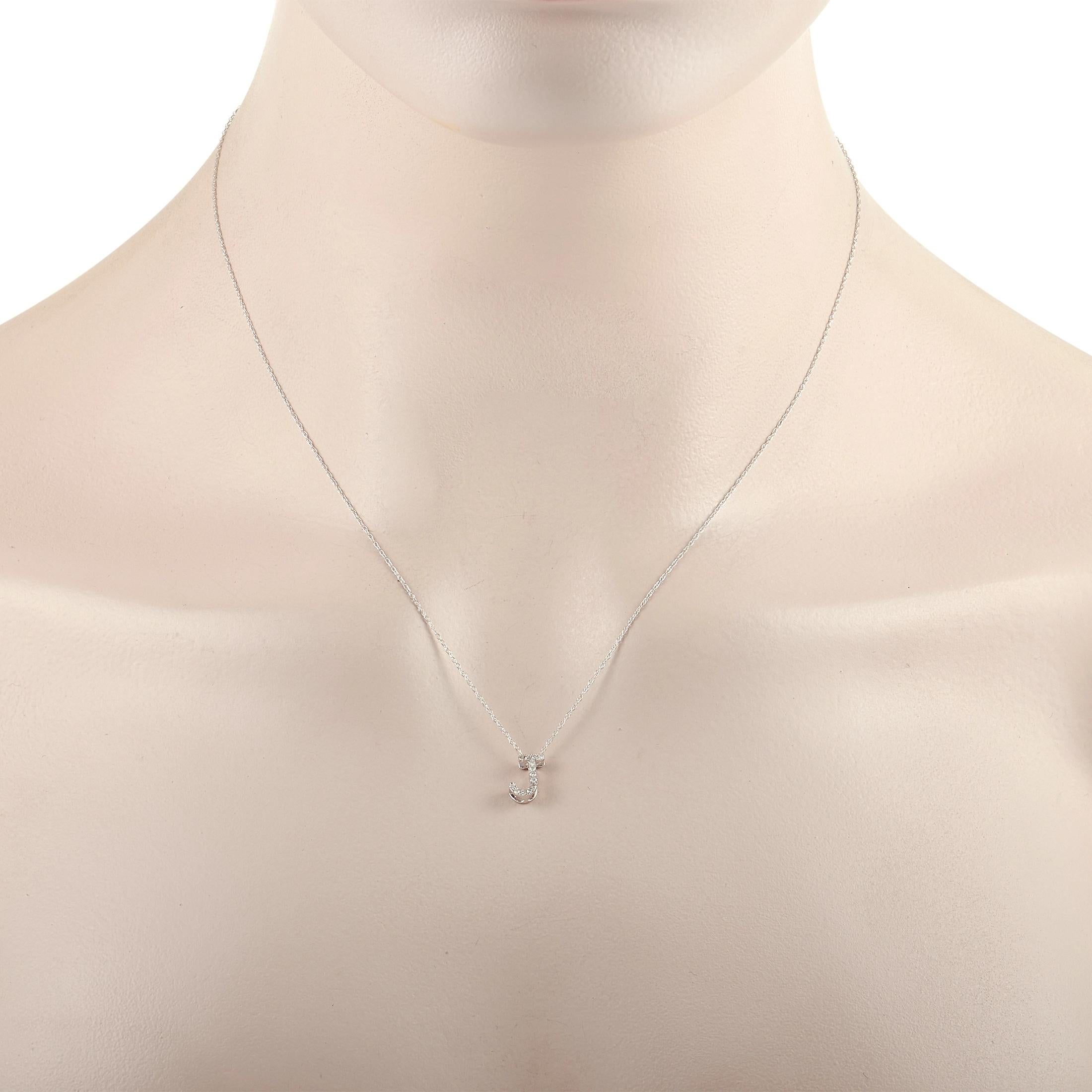 This pretty LB Exclusive 14K White Gold 0.10 ct Diamond Initial ‘J’ Necklace is made with a delicate 14K white gold chain and features a small white gold pendant shaped like the letter ‘J’ and set with 0.10 carats of round diamonds throughout. The