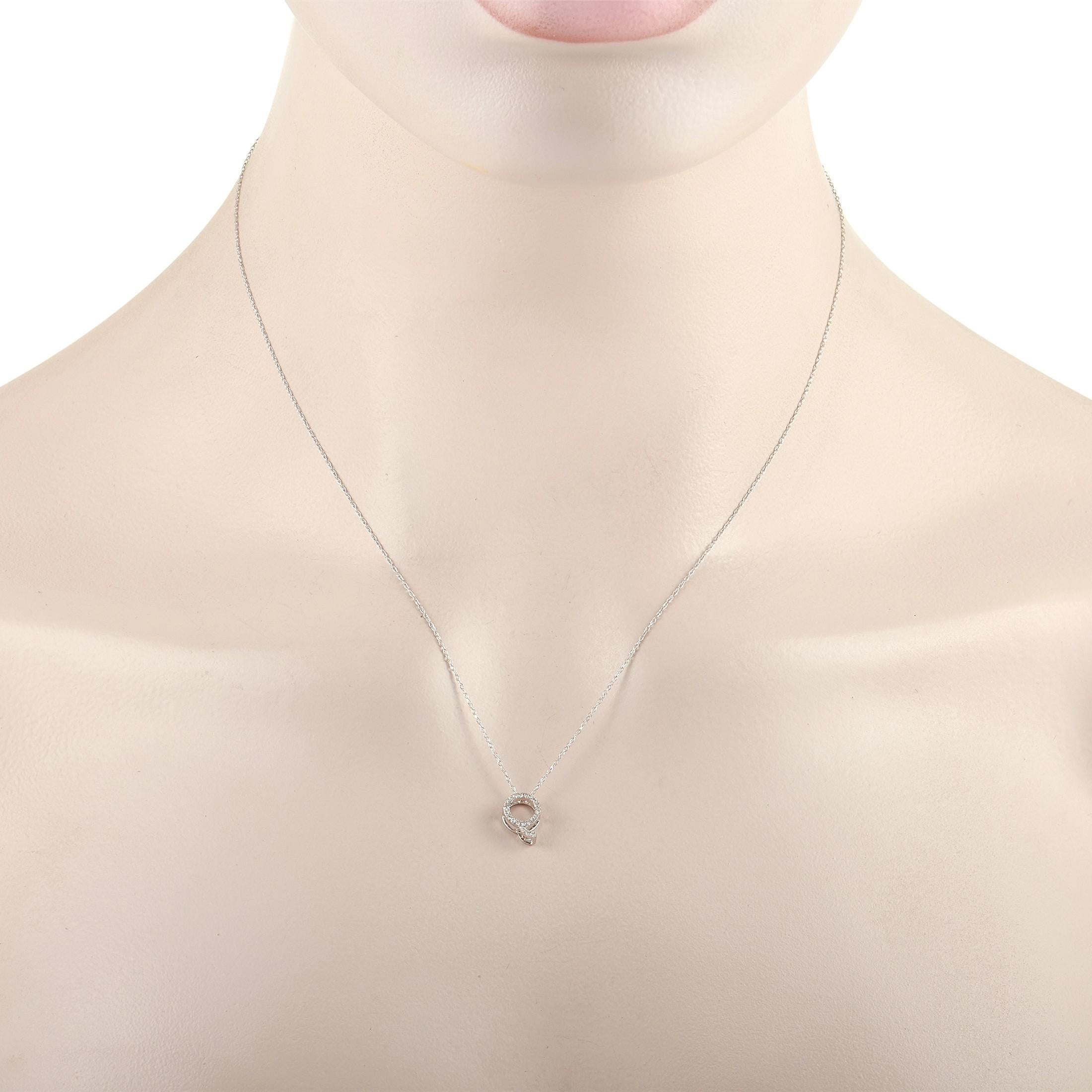 This pretty LB Exclusive 14K White Gold 0.10 ct Diamond Initial ‘Q’ Necklace is made with a delicate 14K white gold chain and features a small white gold pendant shaped like the letter ‘Q’ and set with 0.10 carats of round diamonds throughout. The