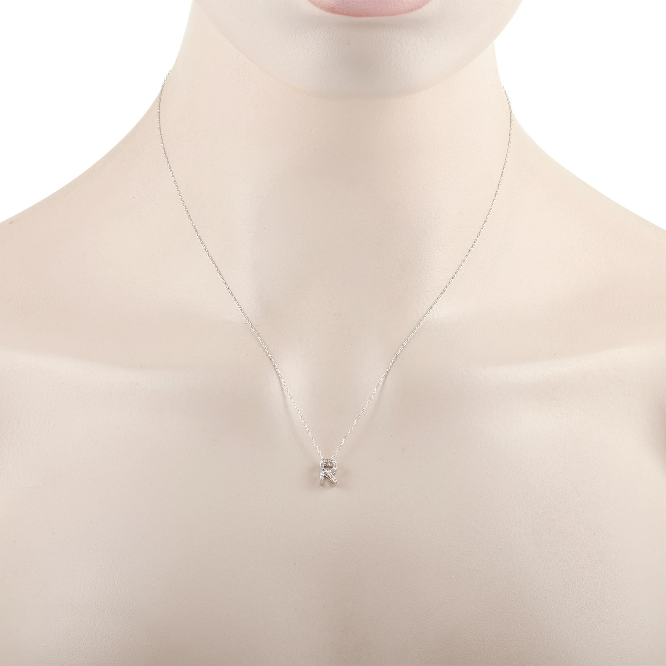 This pretty LB Exclusive 14K White Gold 0.10 ct Diamond Initial ‘R’ Necklace is made with a delicate 14K white gold chain and features a small white gold pendant shaped like the letter ‘R’ and set with 0.10 carats of round diamonds throughout. The