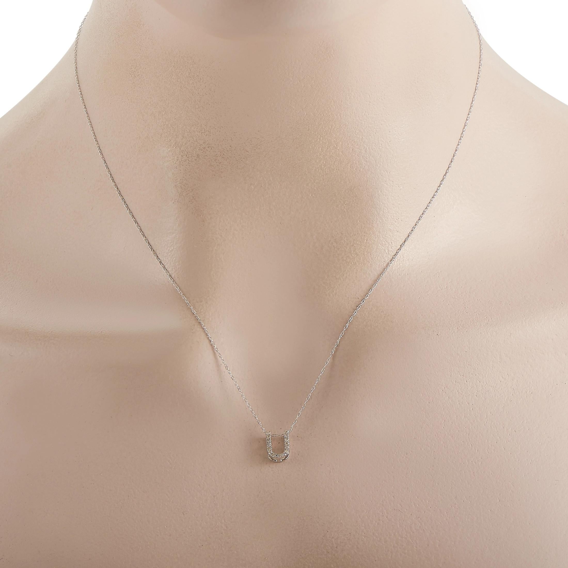 This pretty LB Exclusive 14K White Gold 0.10 ct Diamond Initial ‘U’ Necklace is made with a delicate 14K white gold chain and features a small white gold pendant shaped like the letter ‘U’ and set with 0.10 carats of round diamonds throughout. The