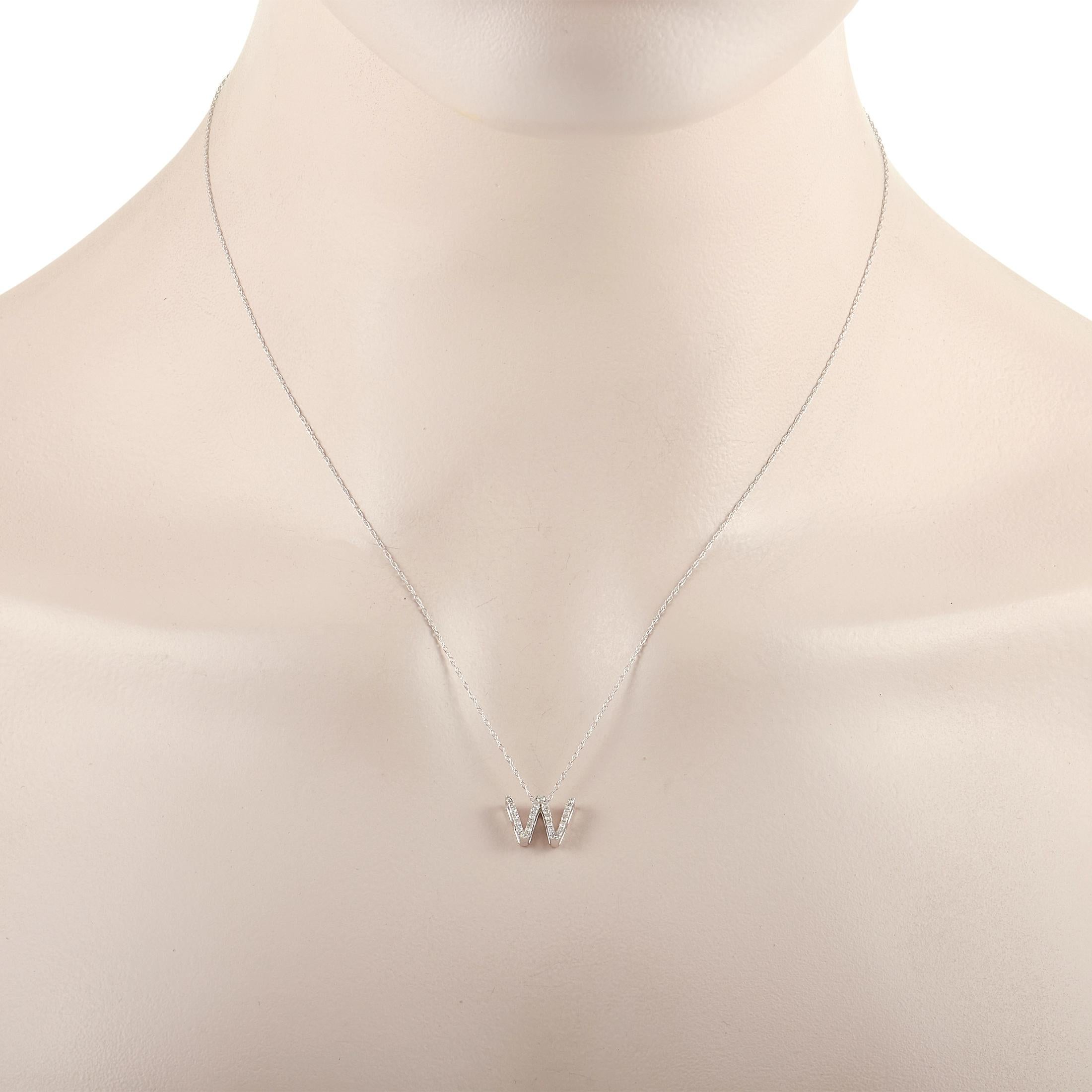 This pretty LB Exclusive 14K White Gold 0.10 ct Diamond Initial ‘W’ Necklace is made with a delicate 14K white gold chain and features a small white gold pendant shaped like the letter ‘W’ and set with 0.10 carats of round diamonds throughout. The
