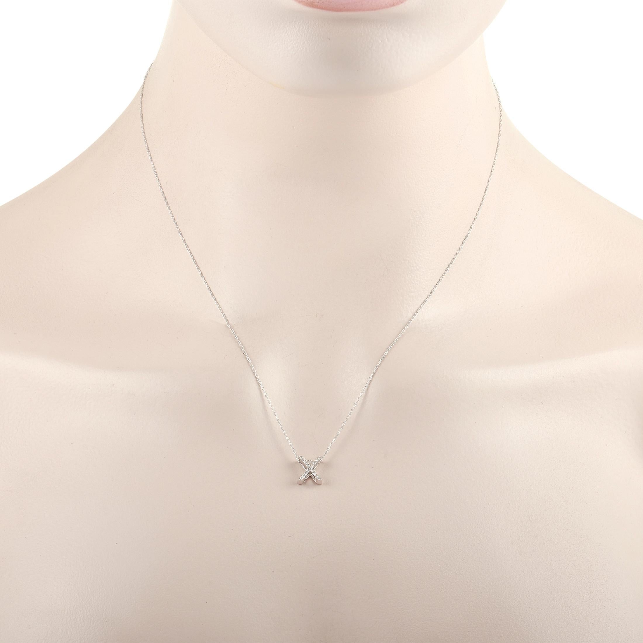This pretty LB Exclusive 14K White Gold 0.10 ct Diamond Initial ‘X’ Necklace is made with a delicate 14K white gold chain and features a small white gold pendant shaped like the letter ‘X’ and set with 0.10 carats of round diamonds throughout. The