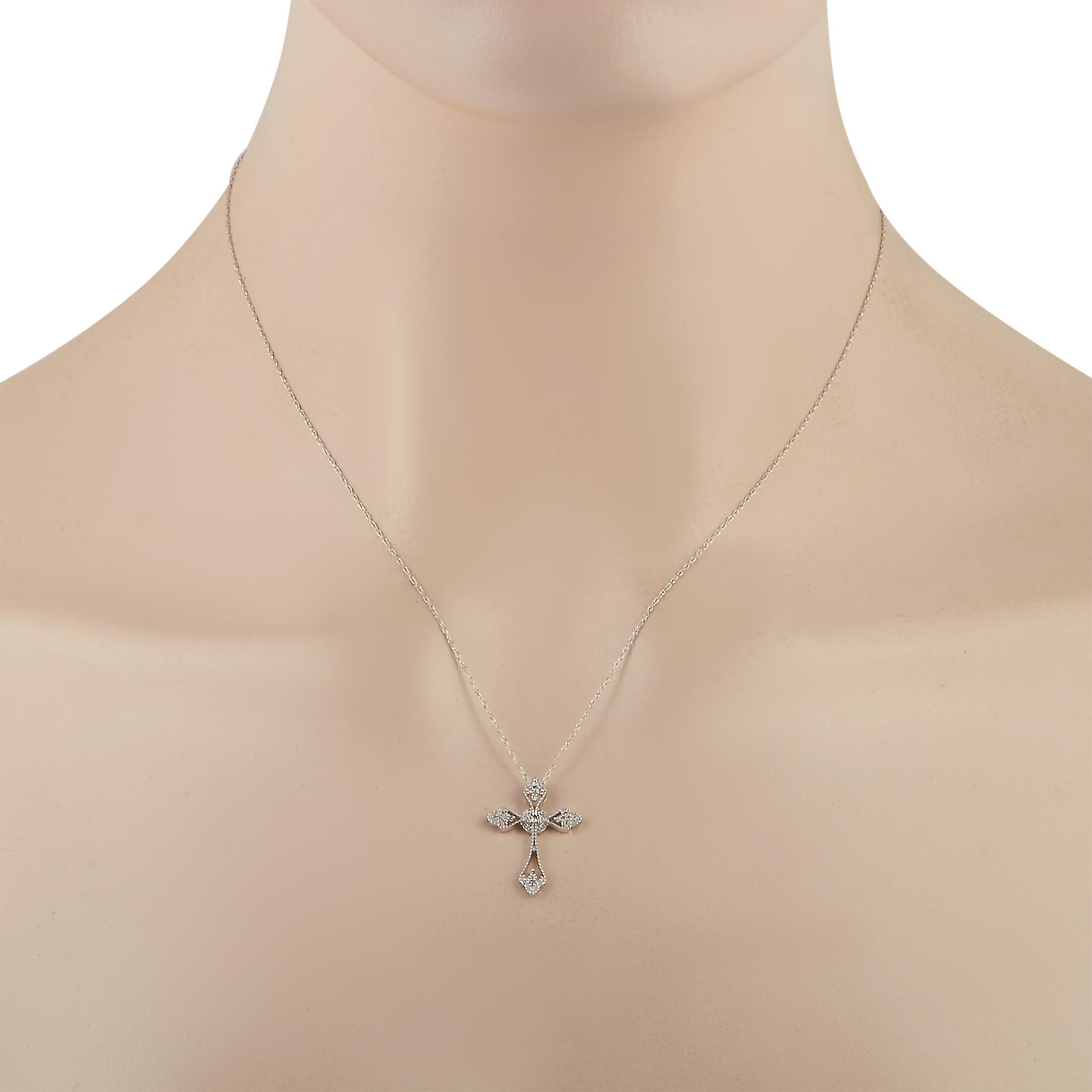 This LB Exclusive necklace is made of 14K white gold and weighs 1.3 grams. It is presented with an 18” chain and a cross pendant that measures 1” in length and 0.50” in width. The necklace is embellished with diamonds that amount to 0.10 carats.
