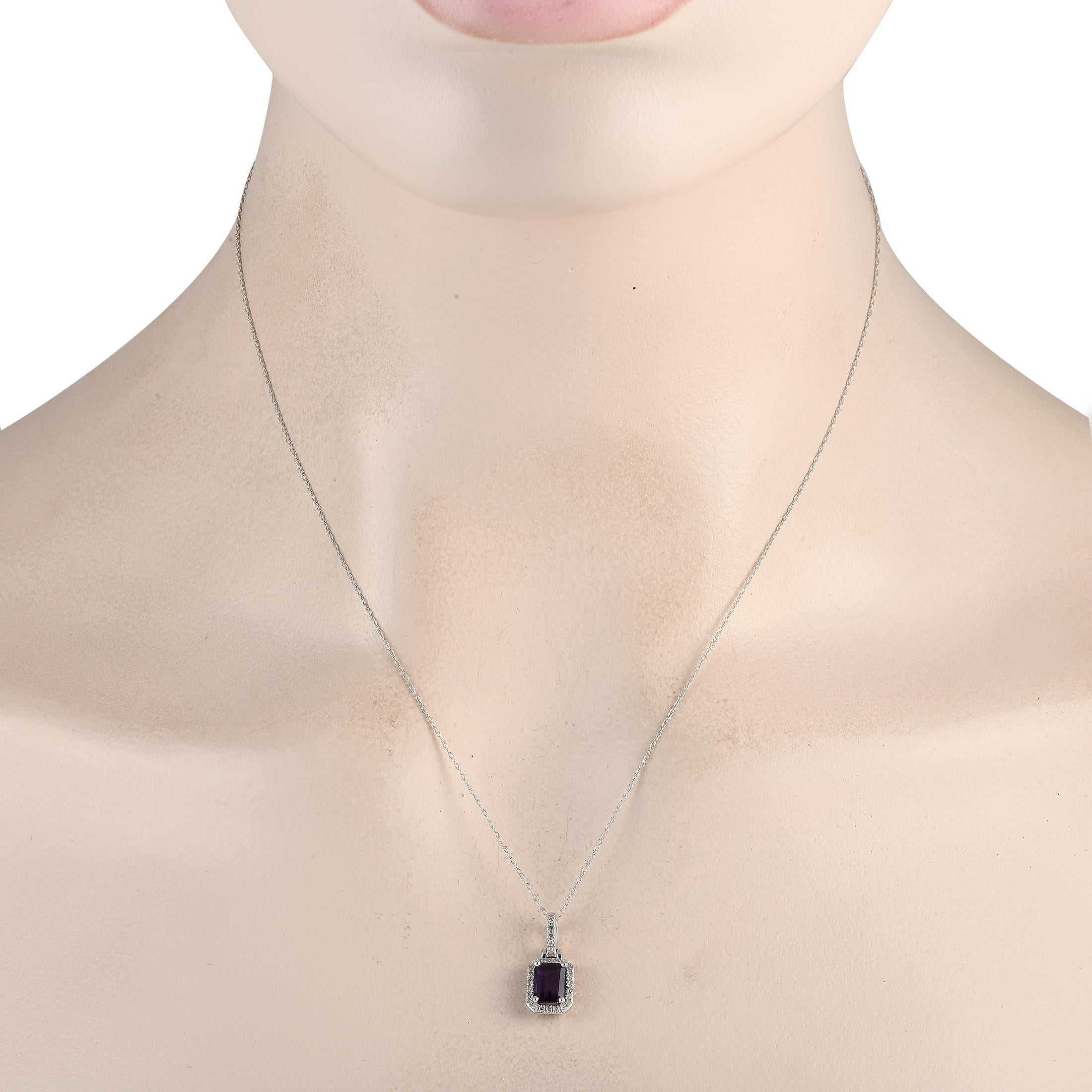 Bring a hint of drama to your wardrobe by accessorizing using this diamond and amethyst necklace. It features a 14K white gold chain with a diamond-studded bail. The pendant has an emerald-cut amethyst secured by four prongs and surrounded by a