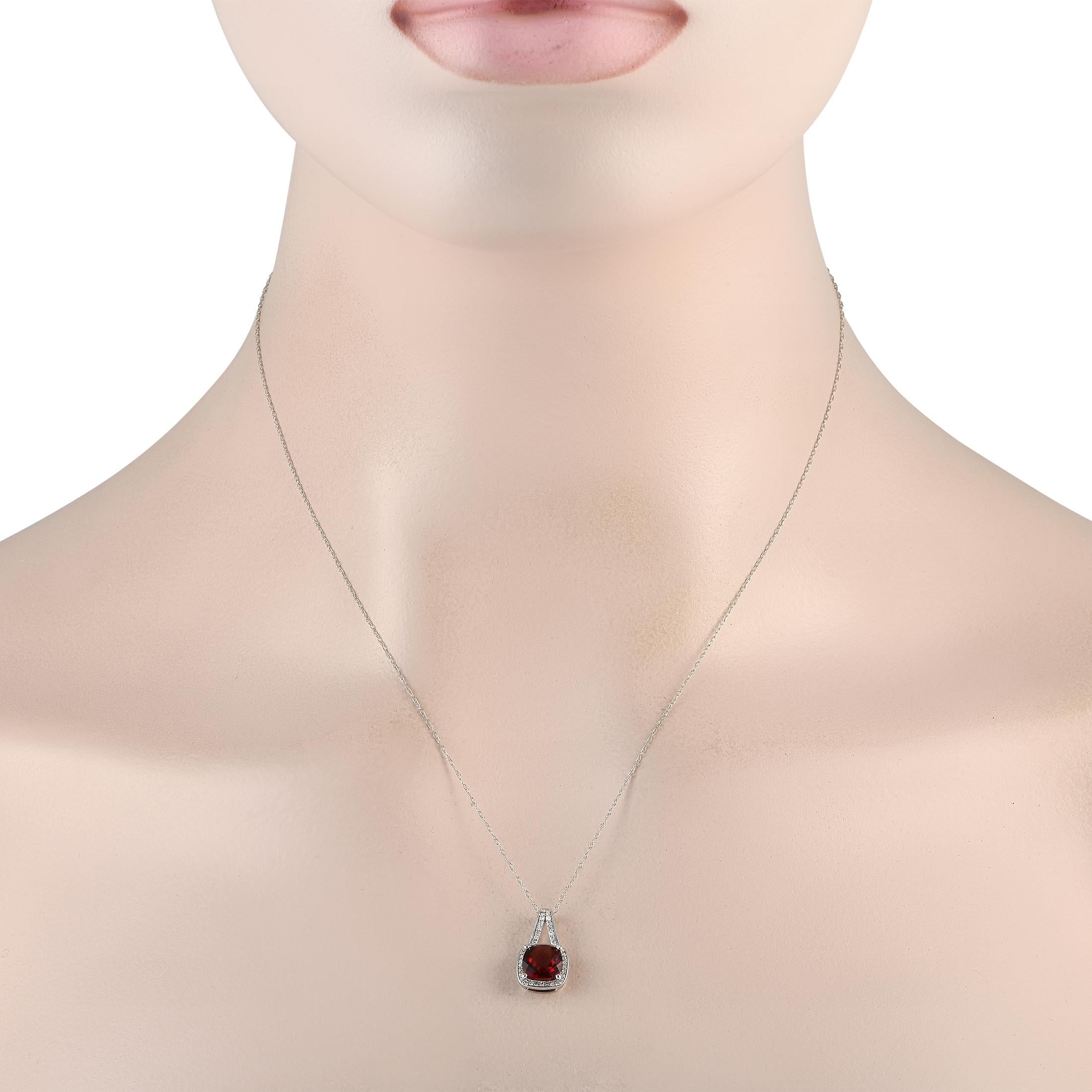 Attract wealth, wisdom, and love by wearing this LB Exclusive garnet necklace. It bears a deep red ruby gemstone believed to be a symbol of prosperity, sagacity, and passion. The 0.65 by 0.45 pendant has a white gold frame, with petite diamonds